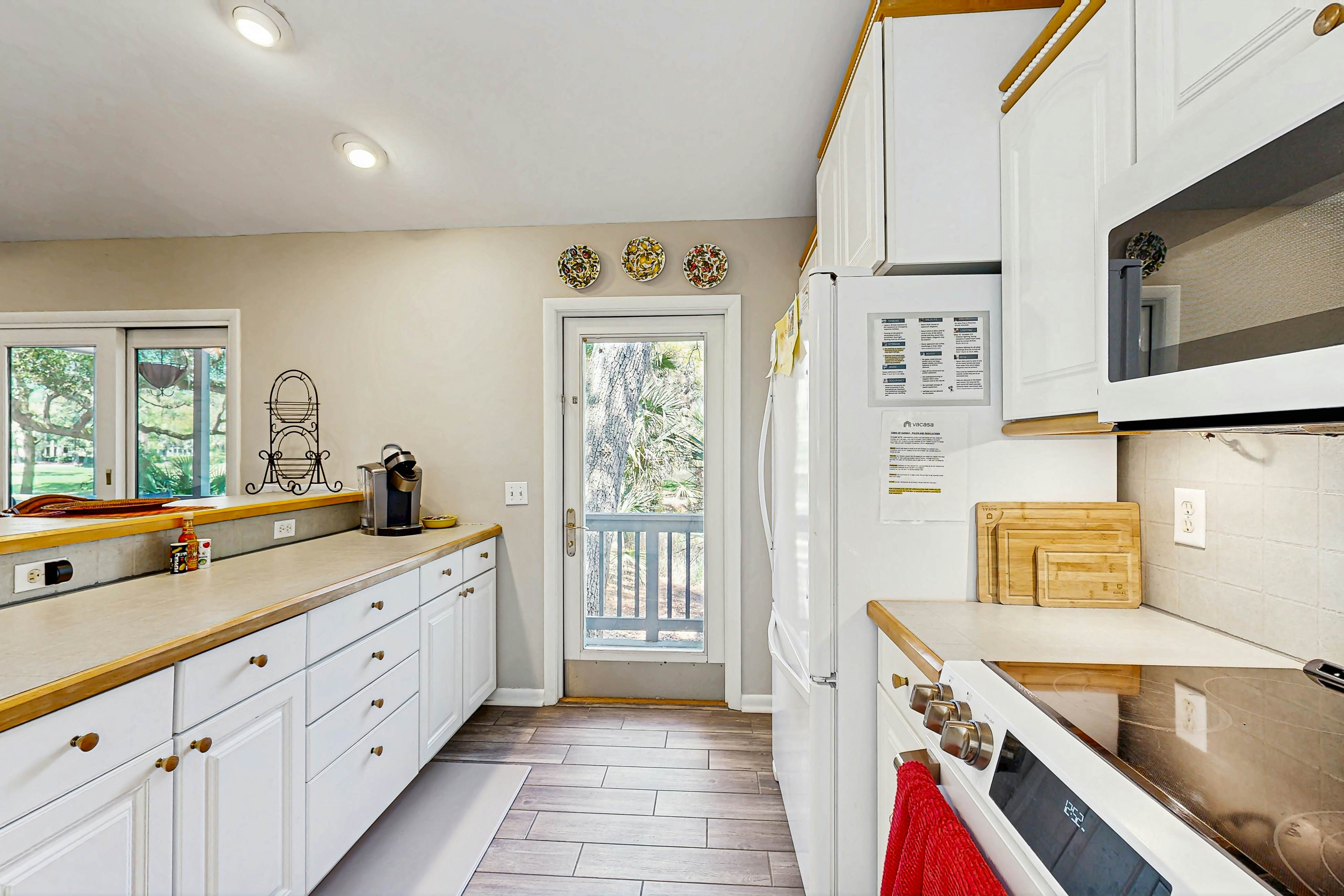 Golf course home with deck, porch & lagoon view - 1 block to beach, 1 dog OK