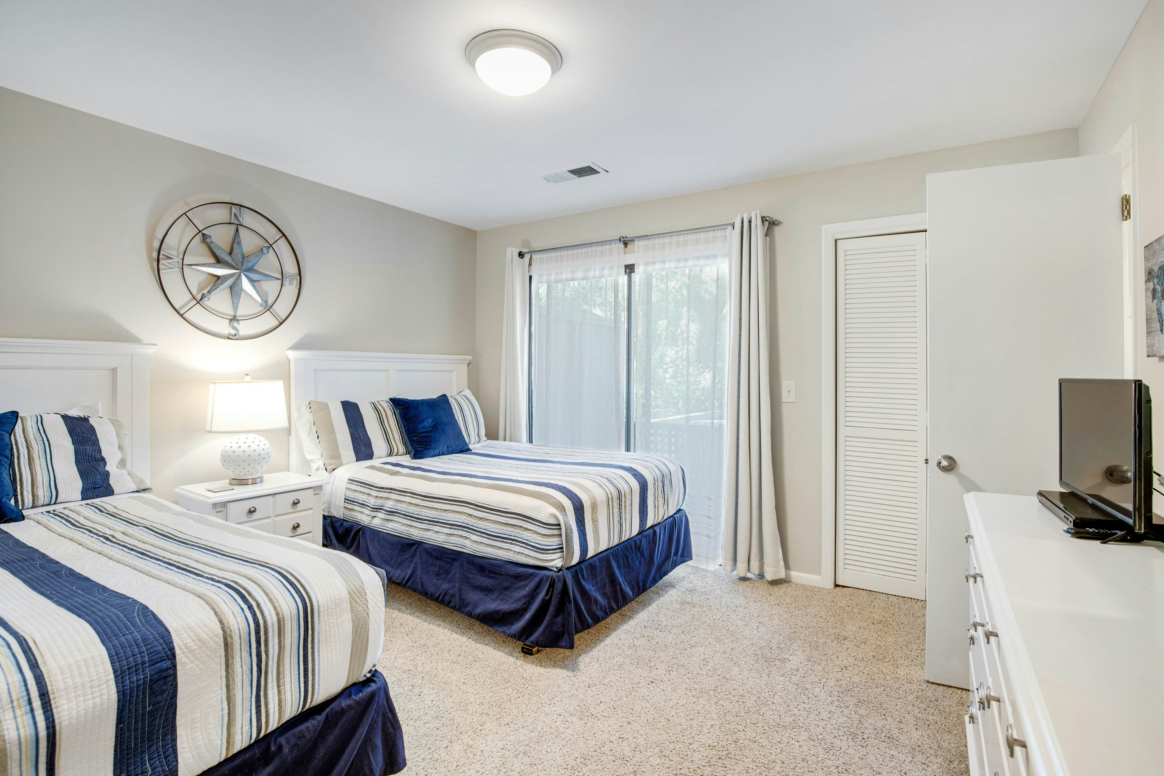 Shaded Lakeview Home with Deck & Screened Porch - Near Beach, Dogs OK