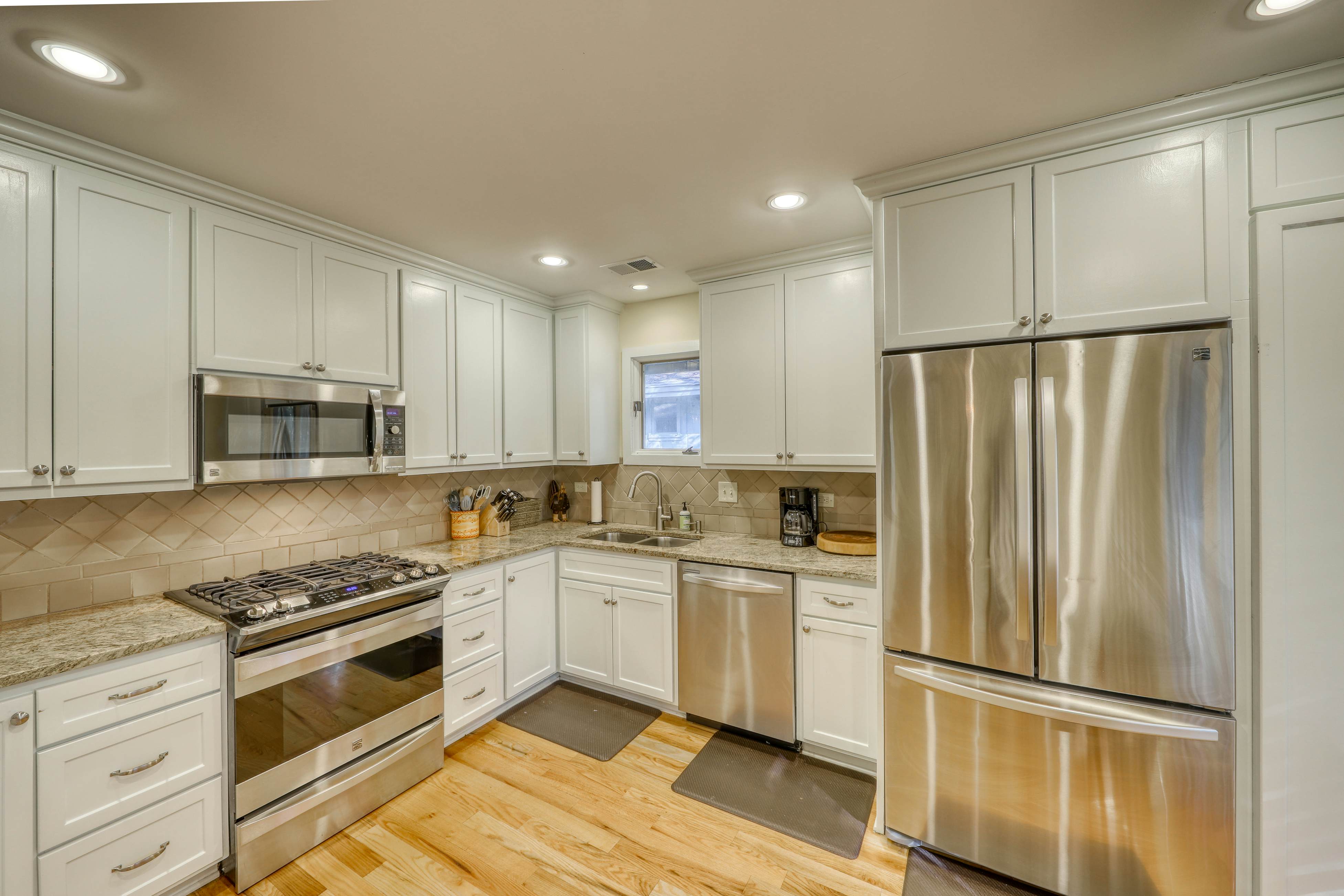 Beautiful Home in the Woods with Updated Amenities and Shared Pool