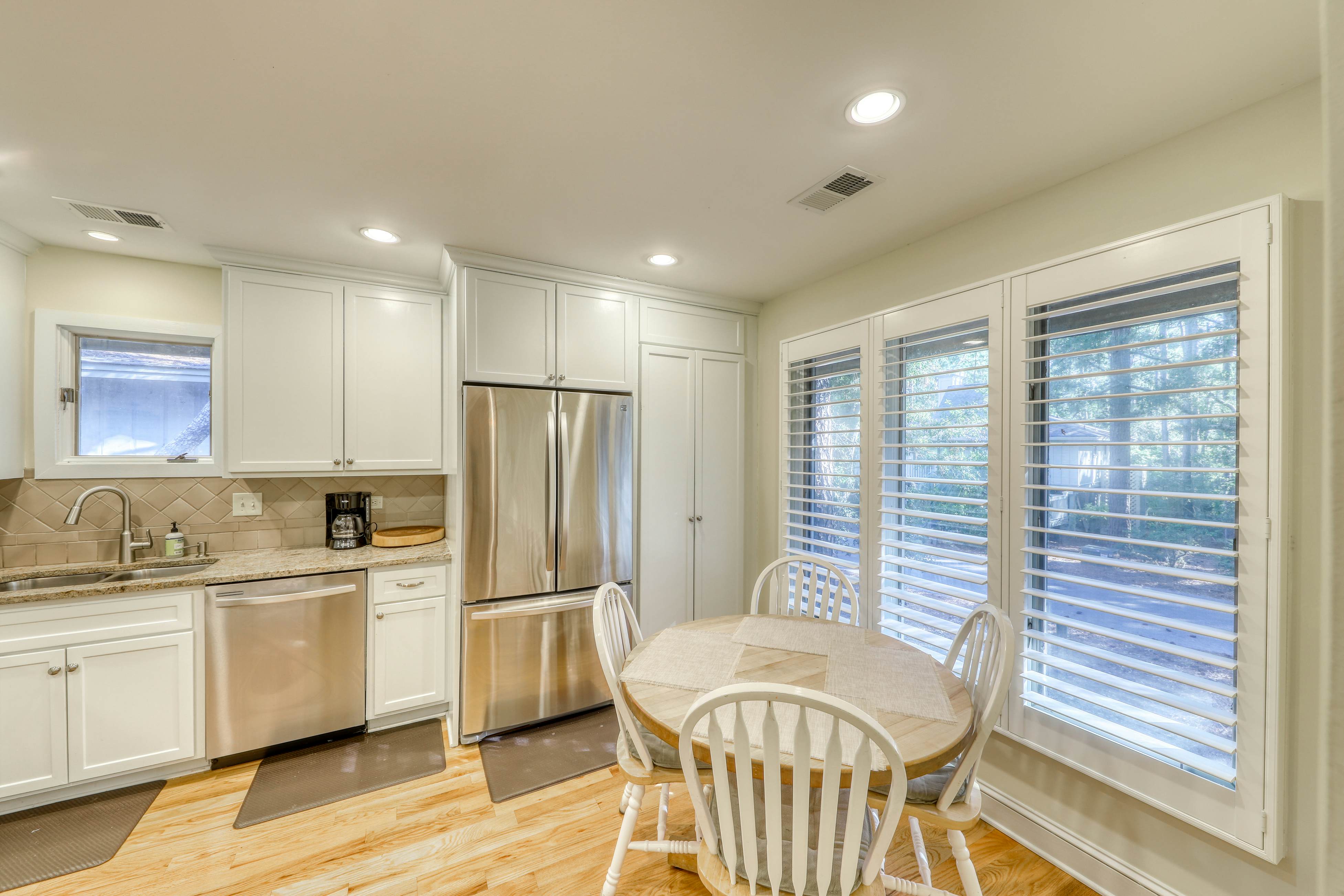 Beautiful Home in the Woods with Updated Amenities and Shared Pool