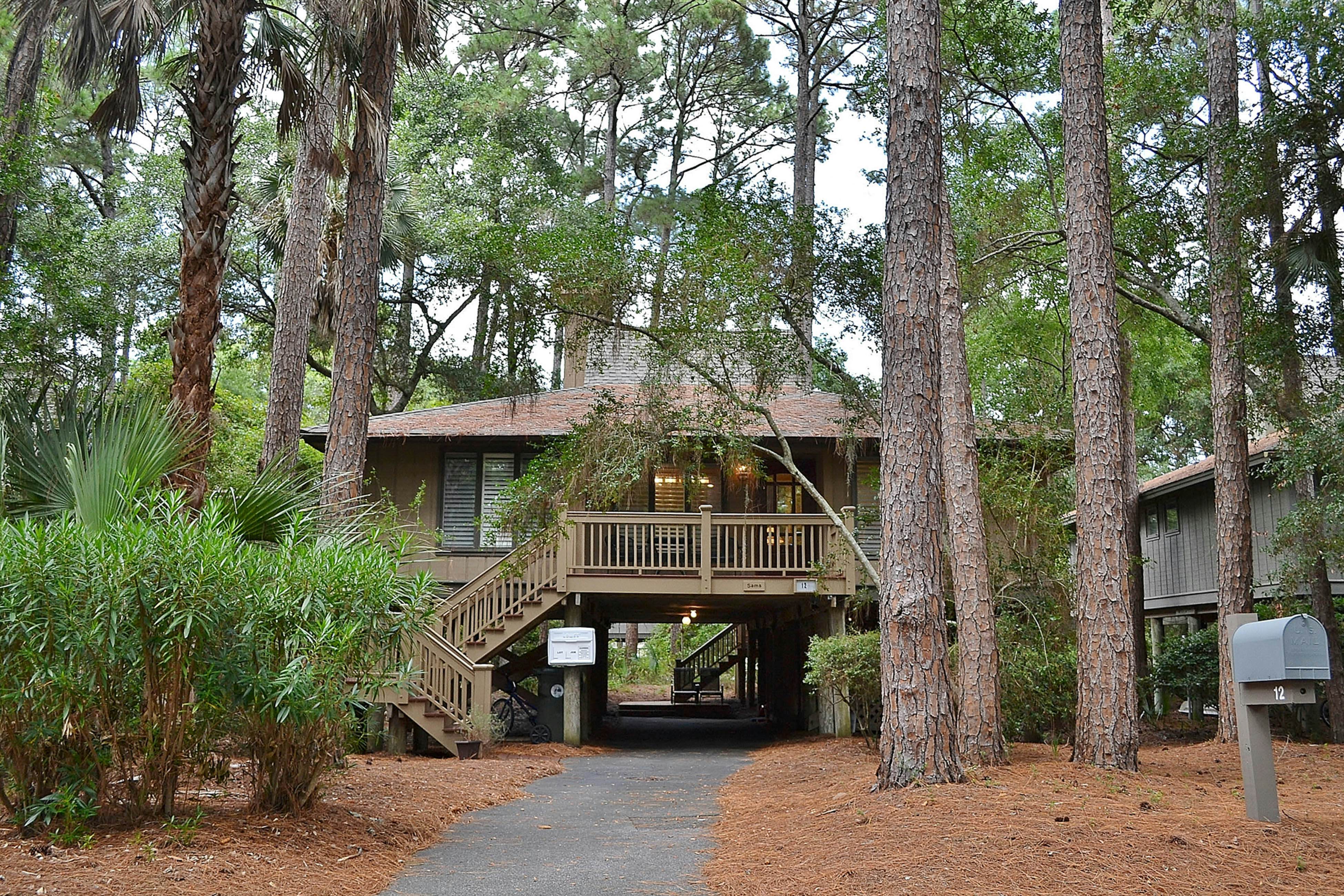 Beautiful Home in the Woods with Updated Amenities and Shared Pool