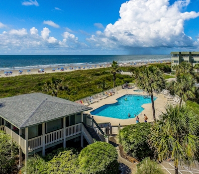 Ocean front condo villa near restaurants & state park with beach access, pool & pier