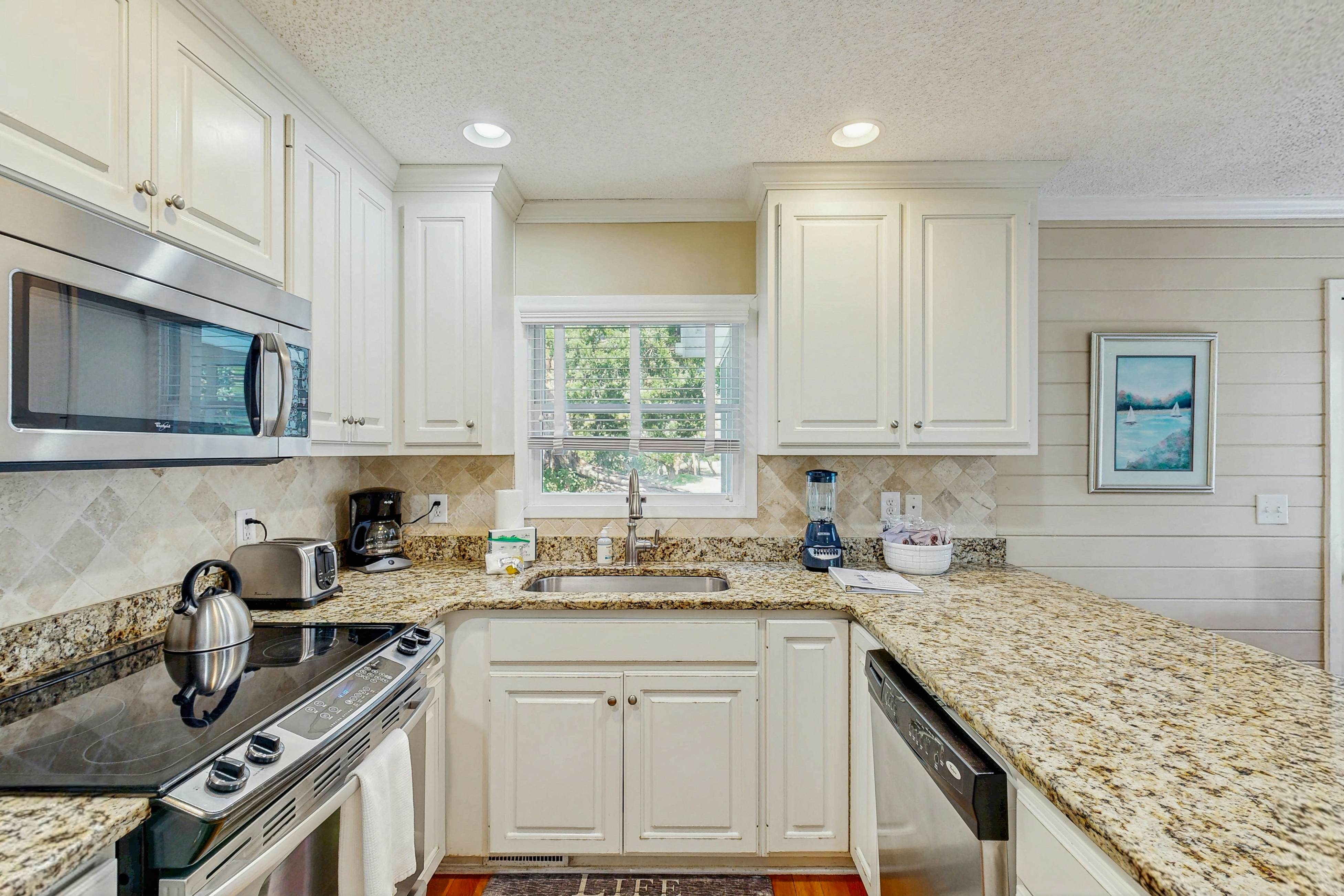 Beautifully decorated cottage steps from the beach with pool & open layout