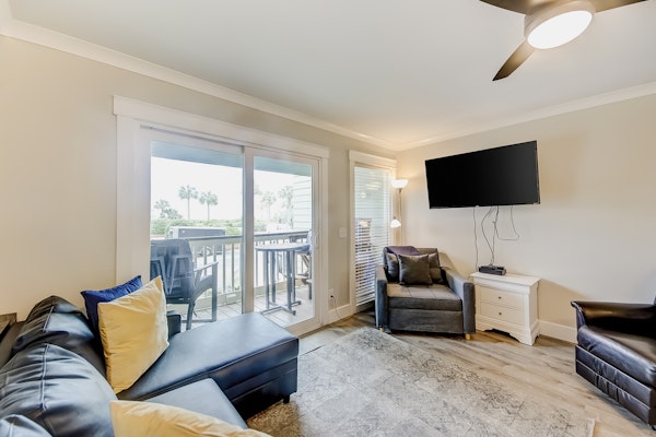 Updated oceanfront condo with balcony, AC, WiFi, pool, pier, & beach access