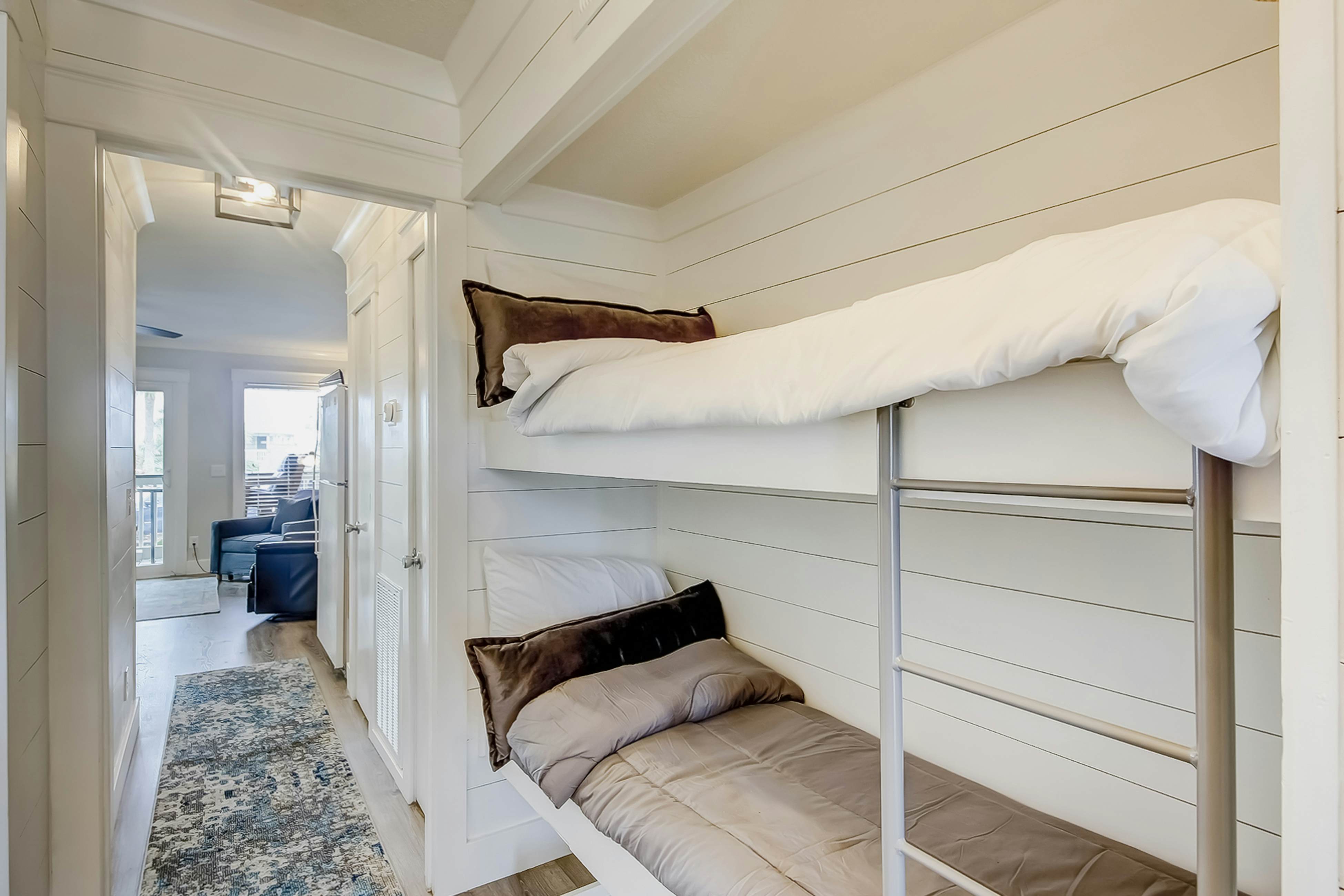 Updated oceanfront condo with balcony, AC, WiFi, pool, pier, & beach access