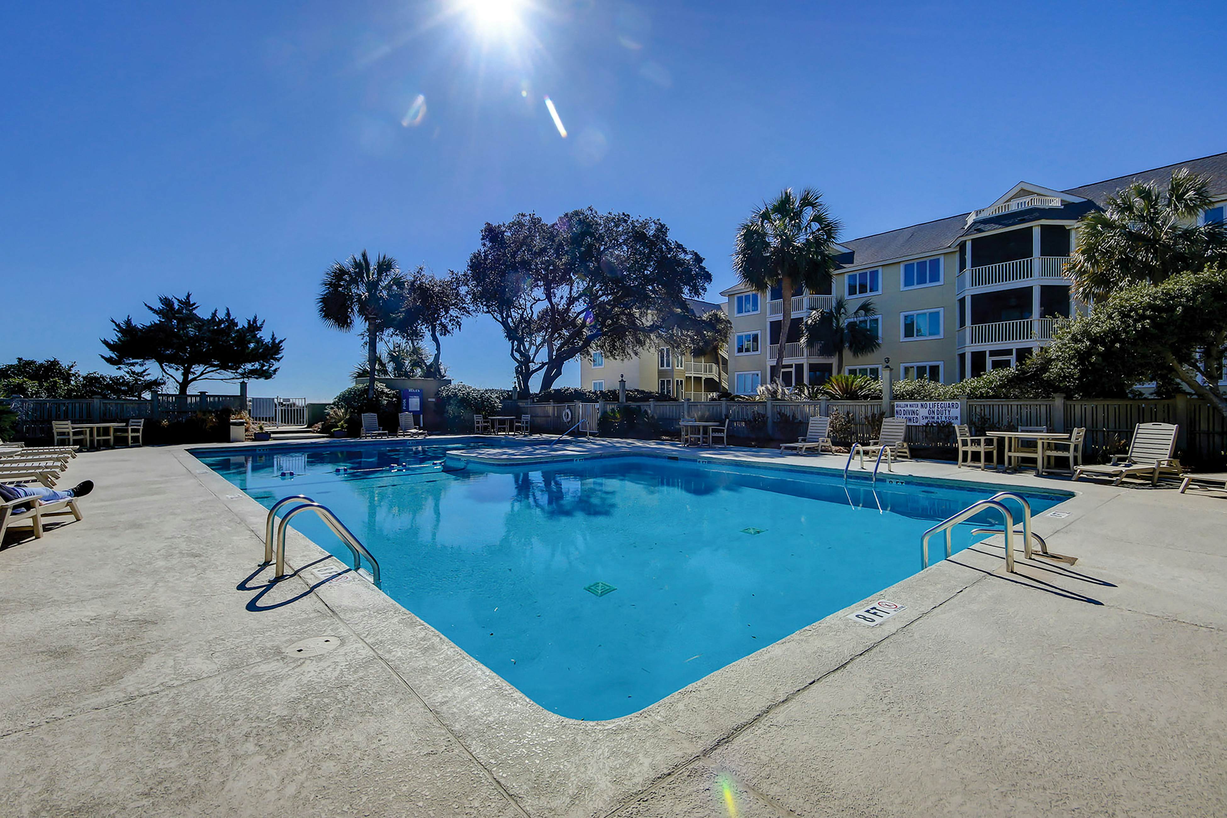 1st-floor condo with beach access, patio, & outdoor pool - snowbirds welcome