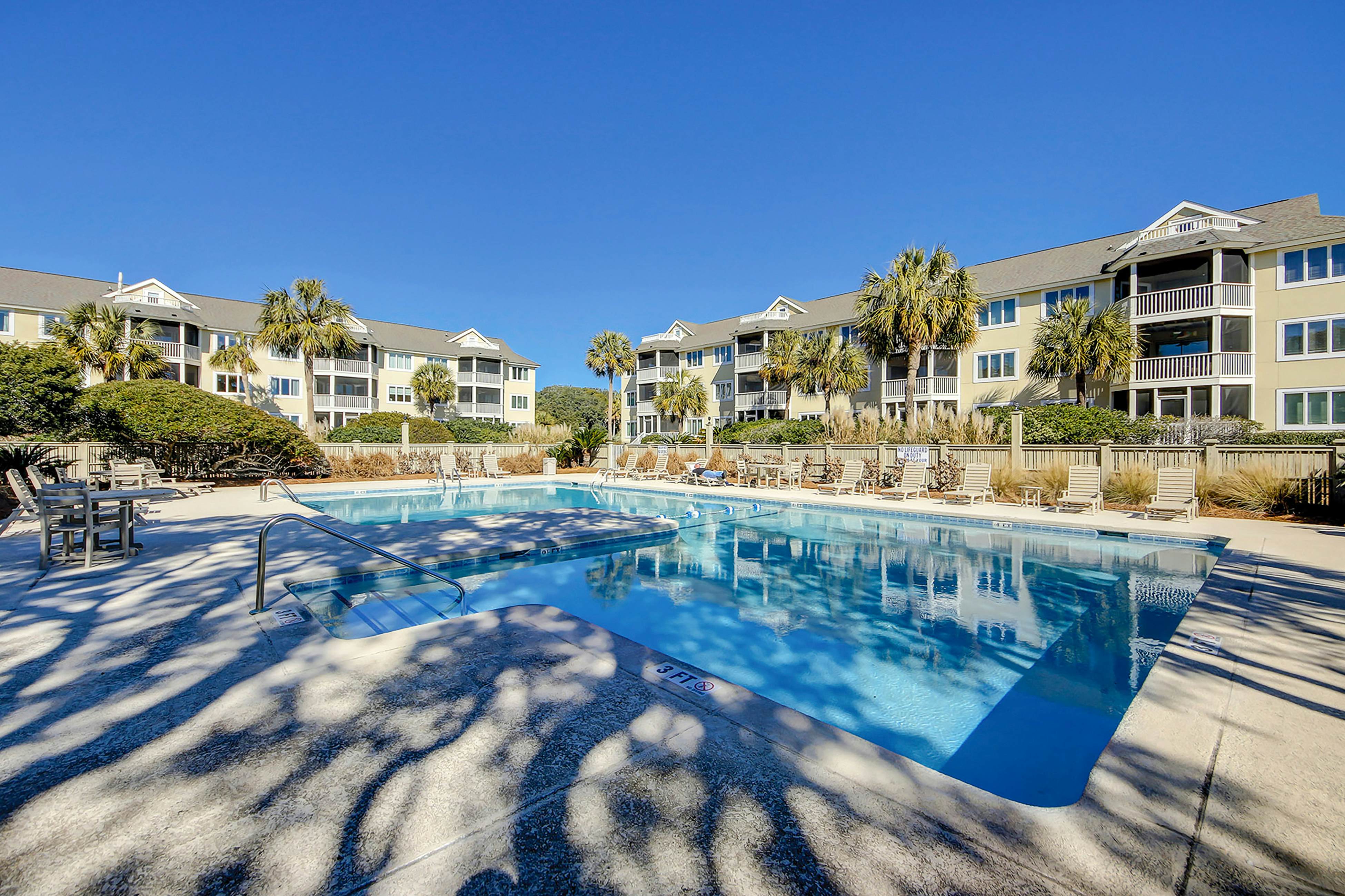 1st-floor condo with beach access, patio, & outdoor pool - snowbirds welcome