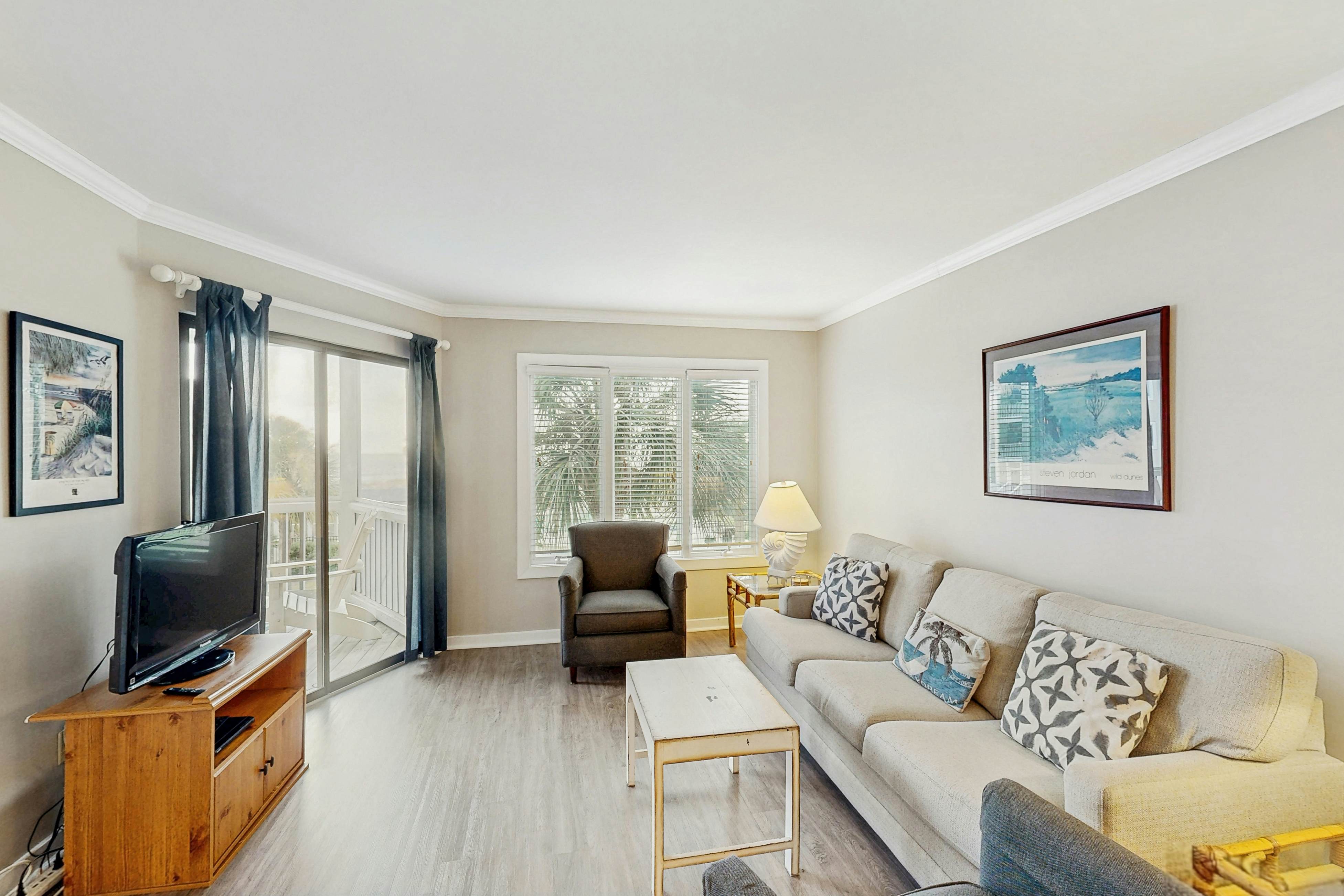 Second-floor villa with lovely ocean views, pickleball, pool & screened deck