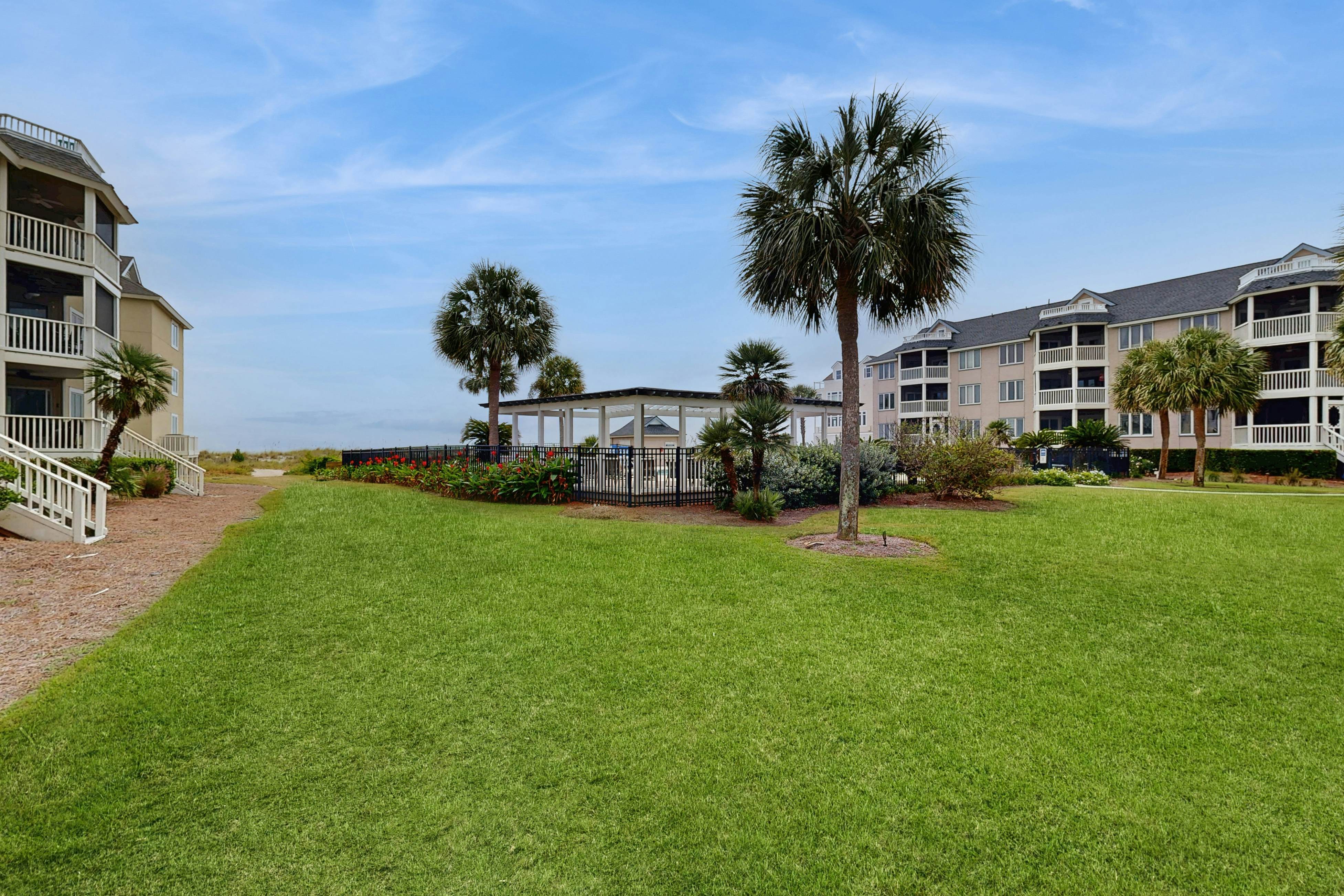 Second-floor villa with lovely ocean views, pickleball, pool & screened deck