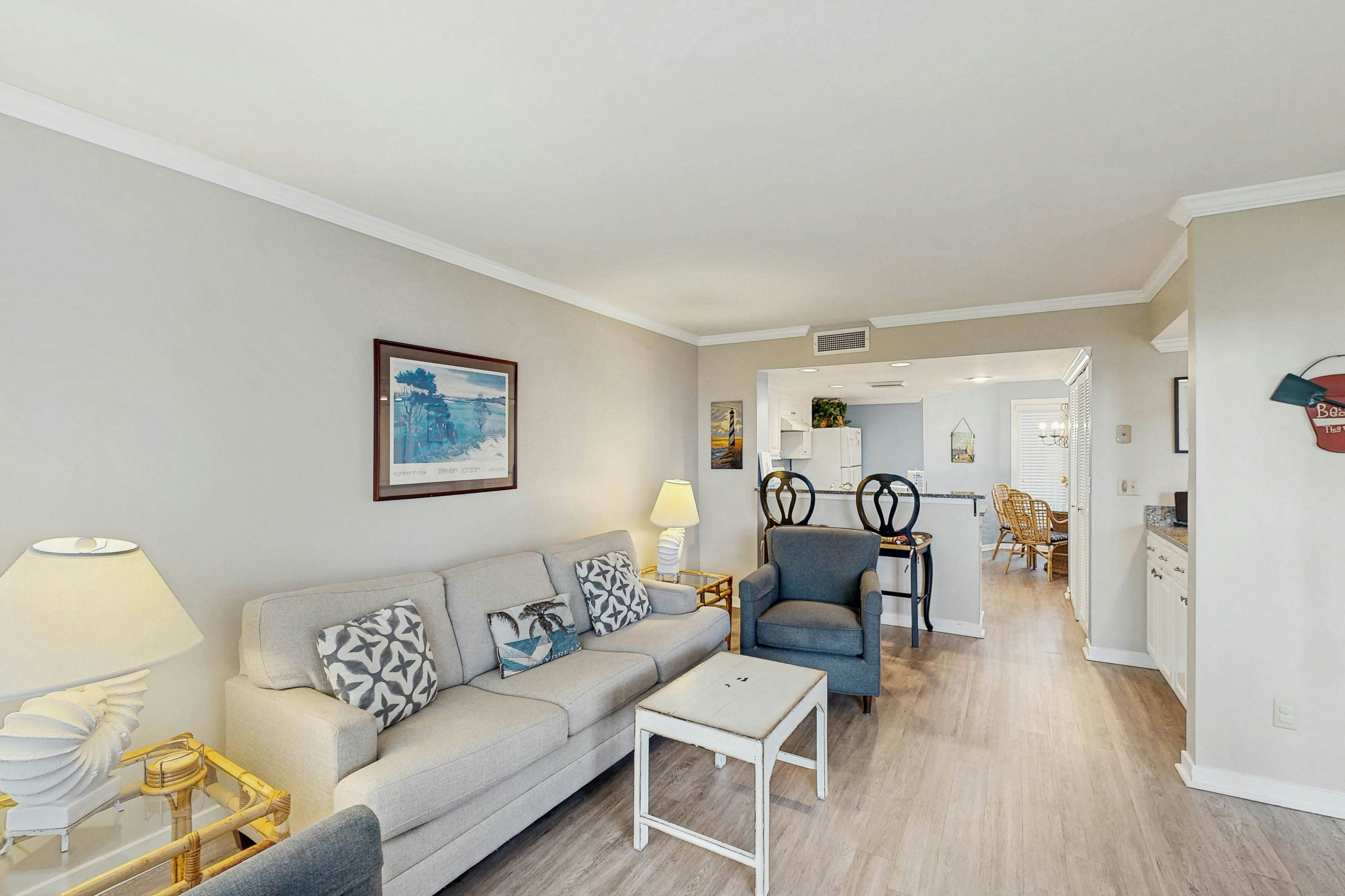 Second-floor villa with lovely ocean views, pickleball, pool & screened deck