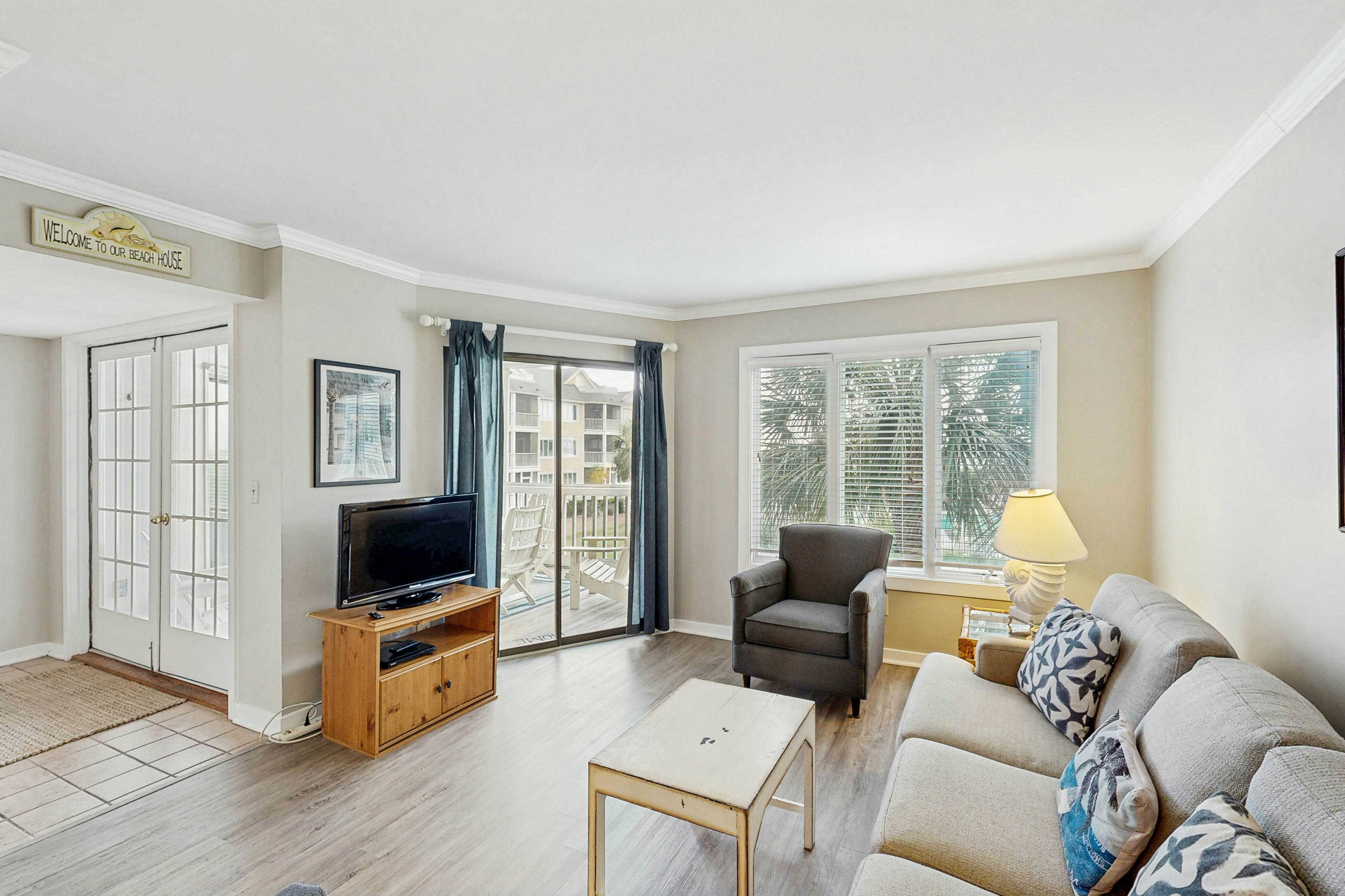 Second-floor villa with lovely ocean views, pickleball, pool & screened deck