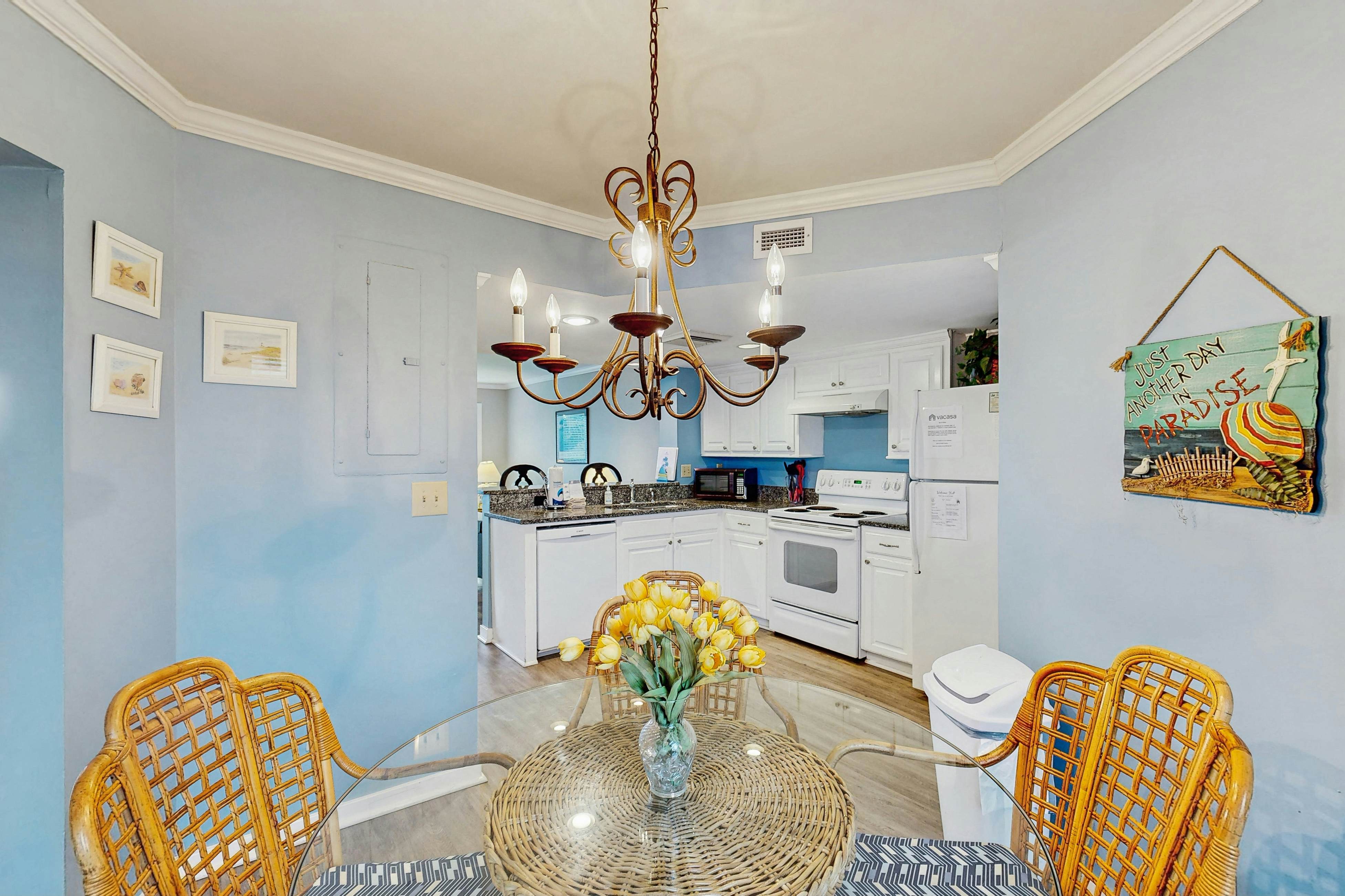 Second-floor villa with lovely ocean views, pickleball, pool & screened deck