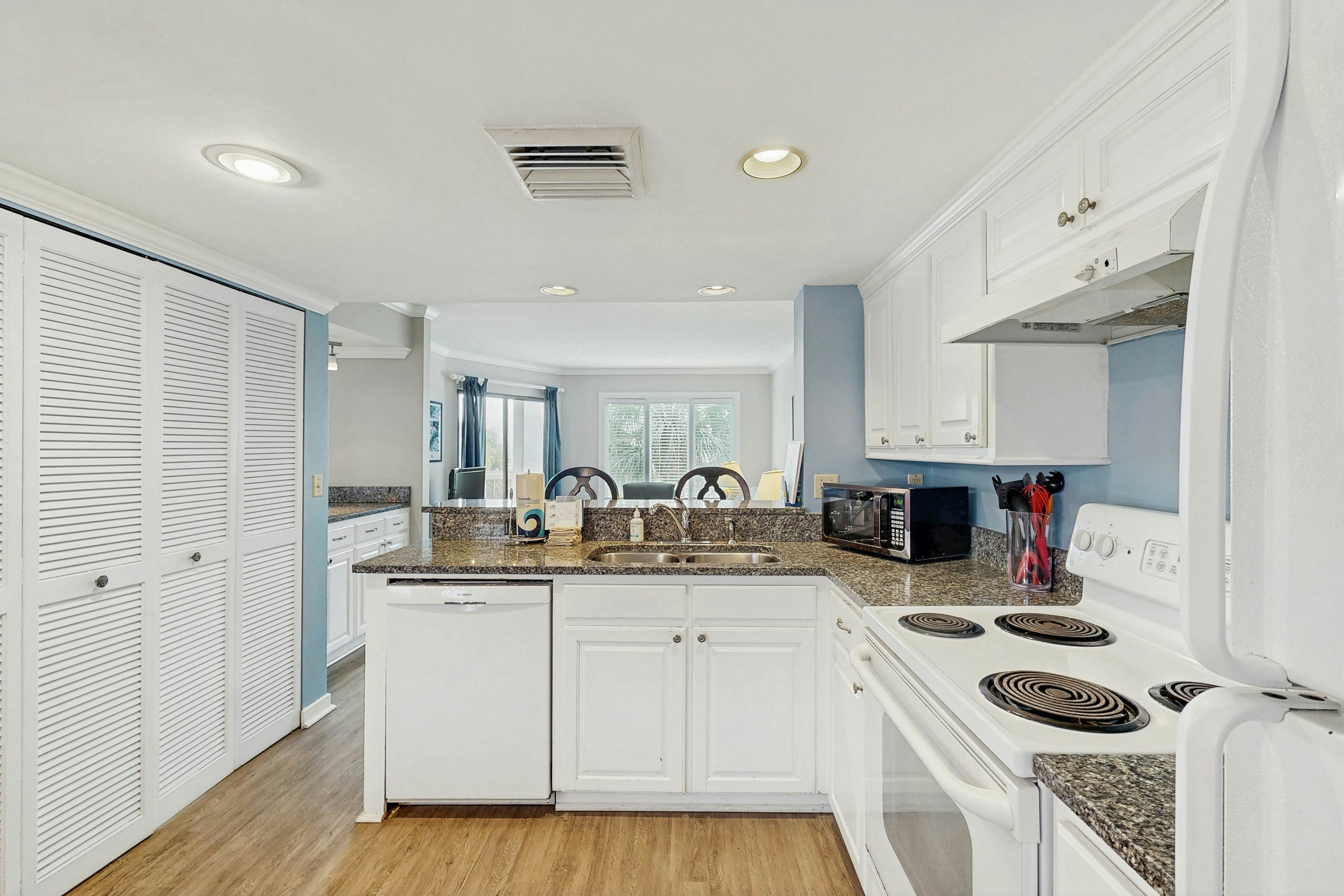 Second-floor villa with lovely ocean views, pickleball, pool & screened deck