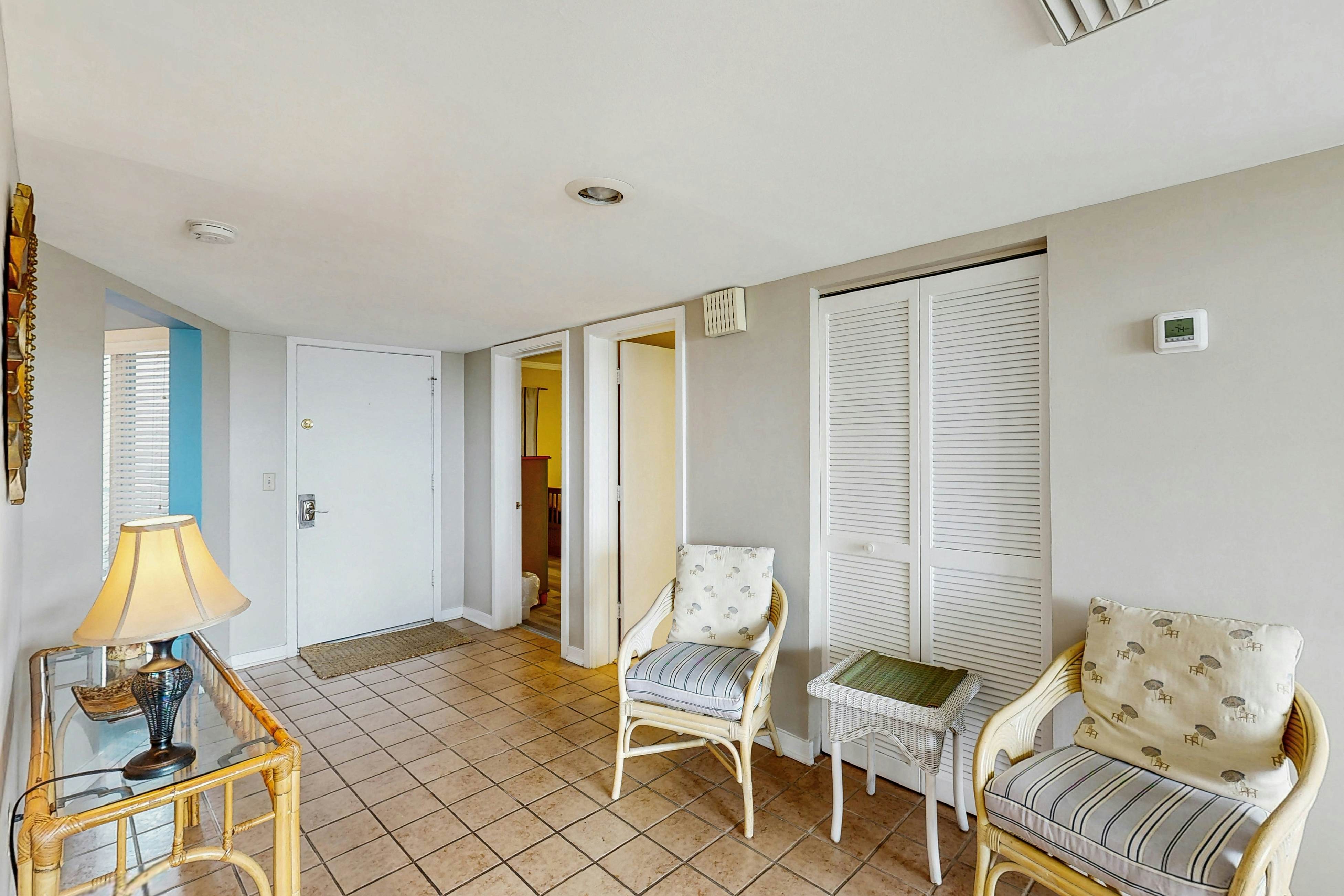 Second-floor villa with lovely ocean views, pickleball, pool & screened deck