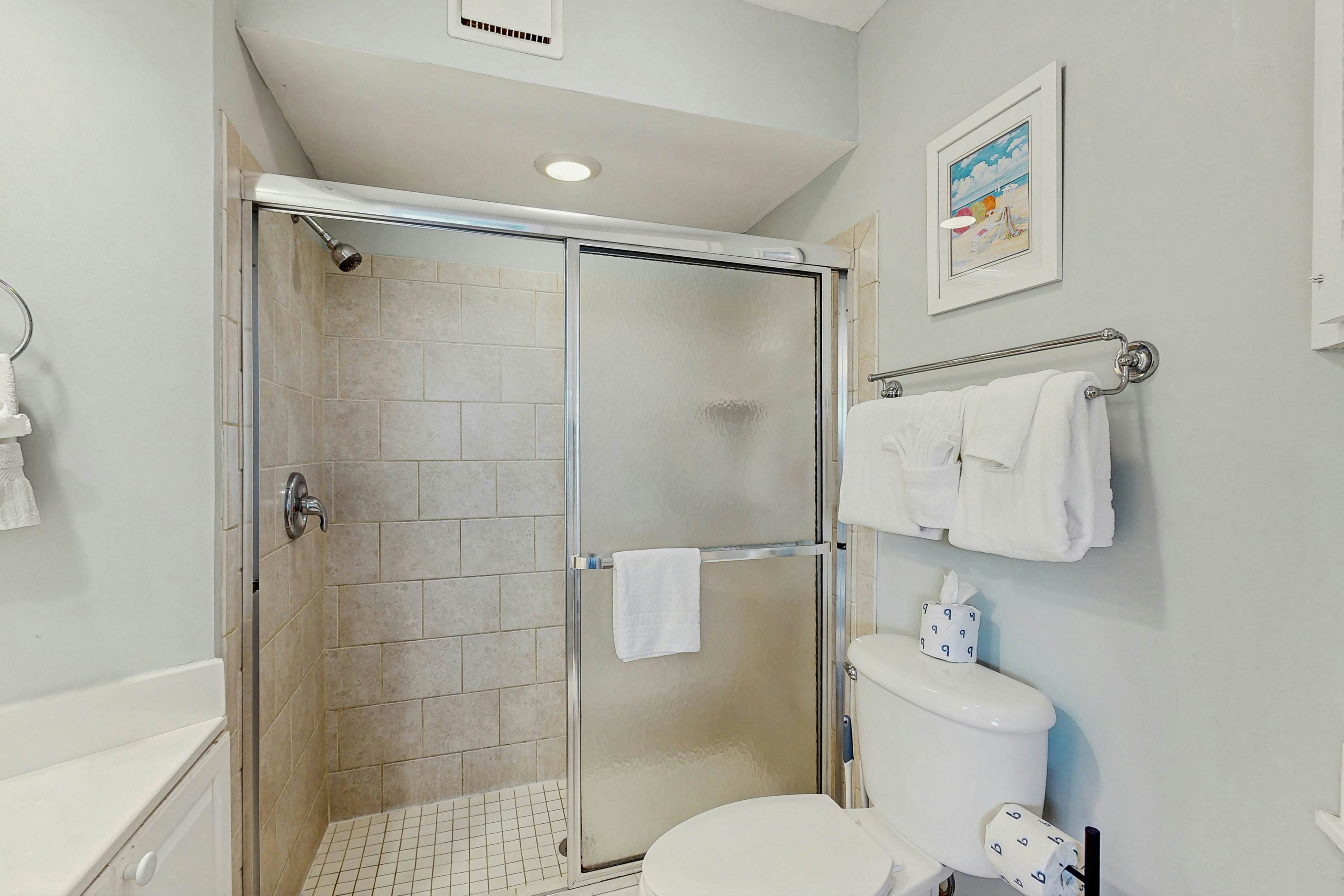 Second-floor villa with lovely ocean views, pickleball, pool & screened deck