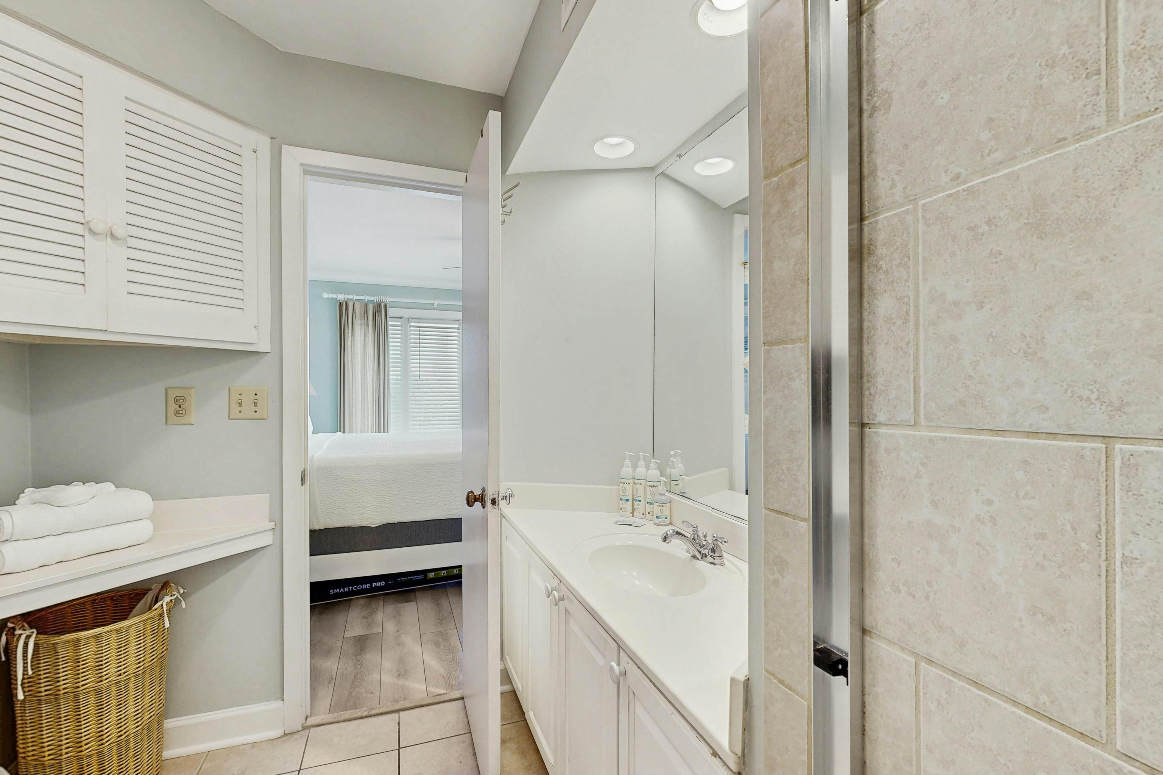 Second-floor villa with lovely ocean views, pickleball, pool & screened deck