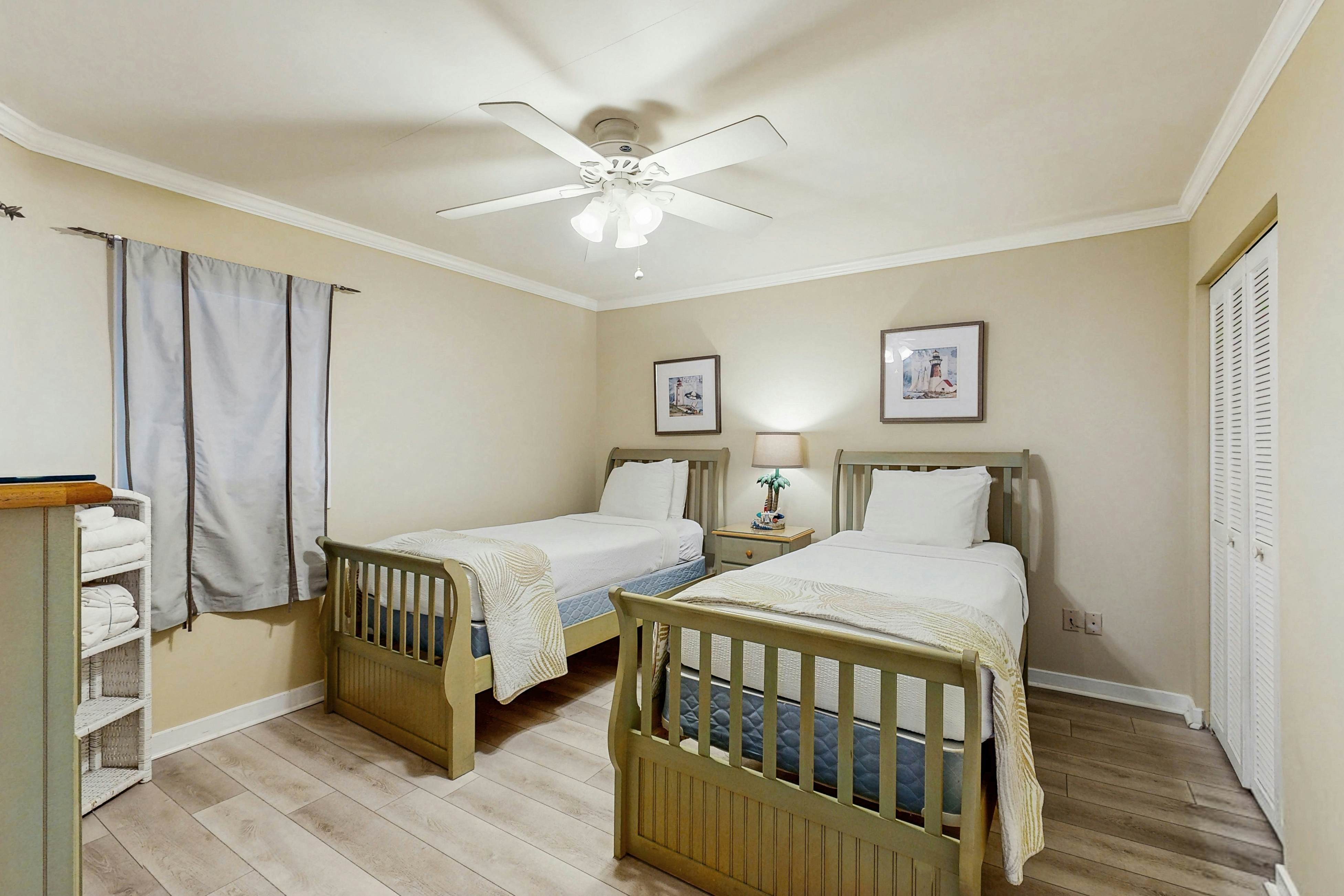 Second-floor villa with lovely ocean views, pickleball, pool & screened deck