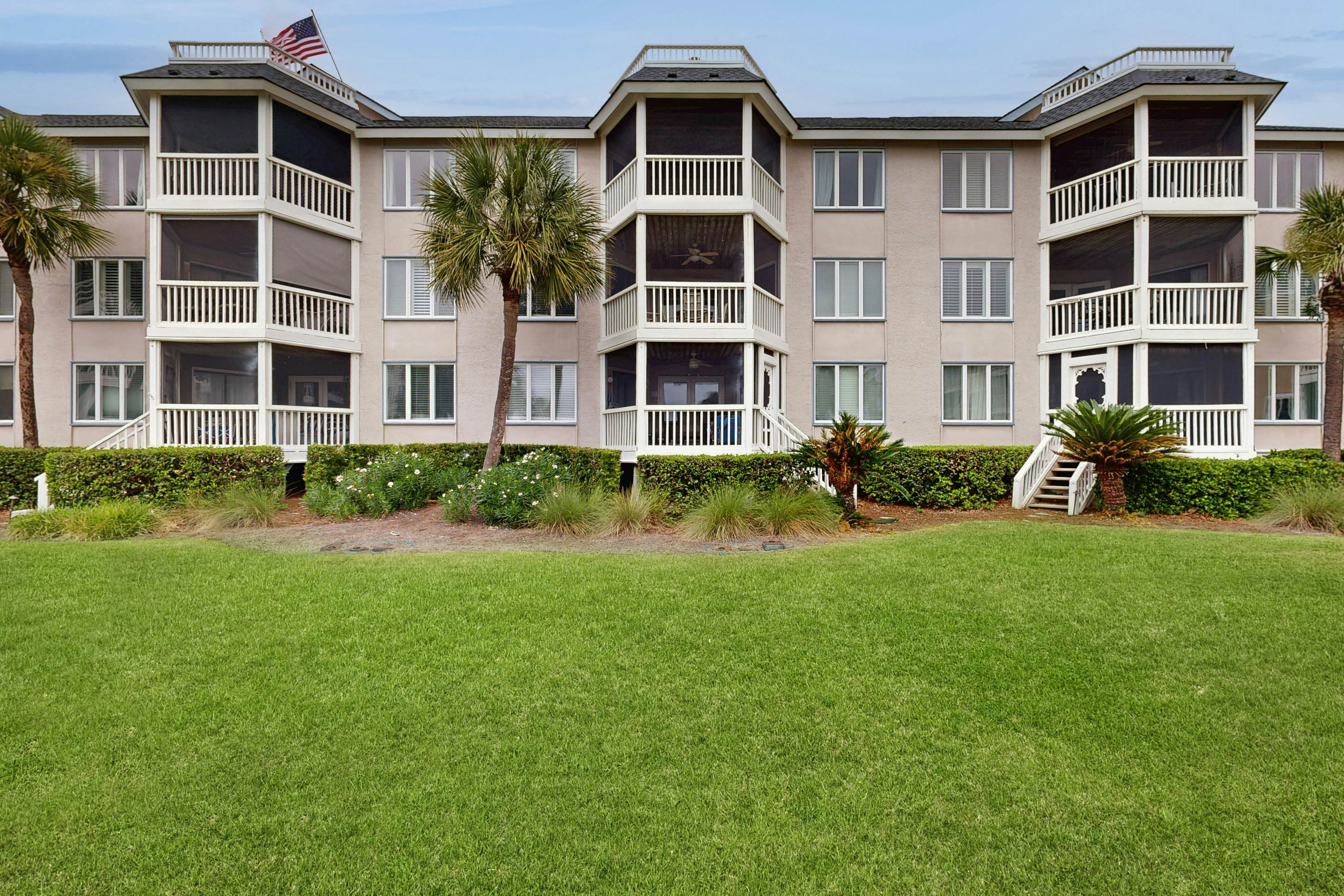 Second-floor villa with lovely ocean views, pickleball, pool & screened deck