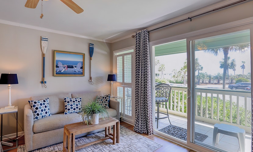 Beachfront condo with pool, beach access, pier, private balcony, & central AC