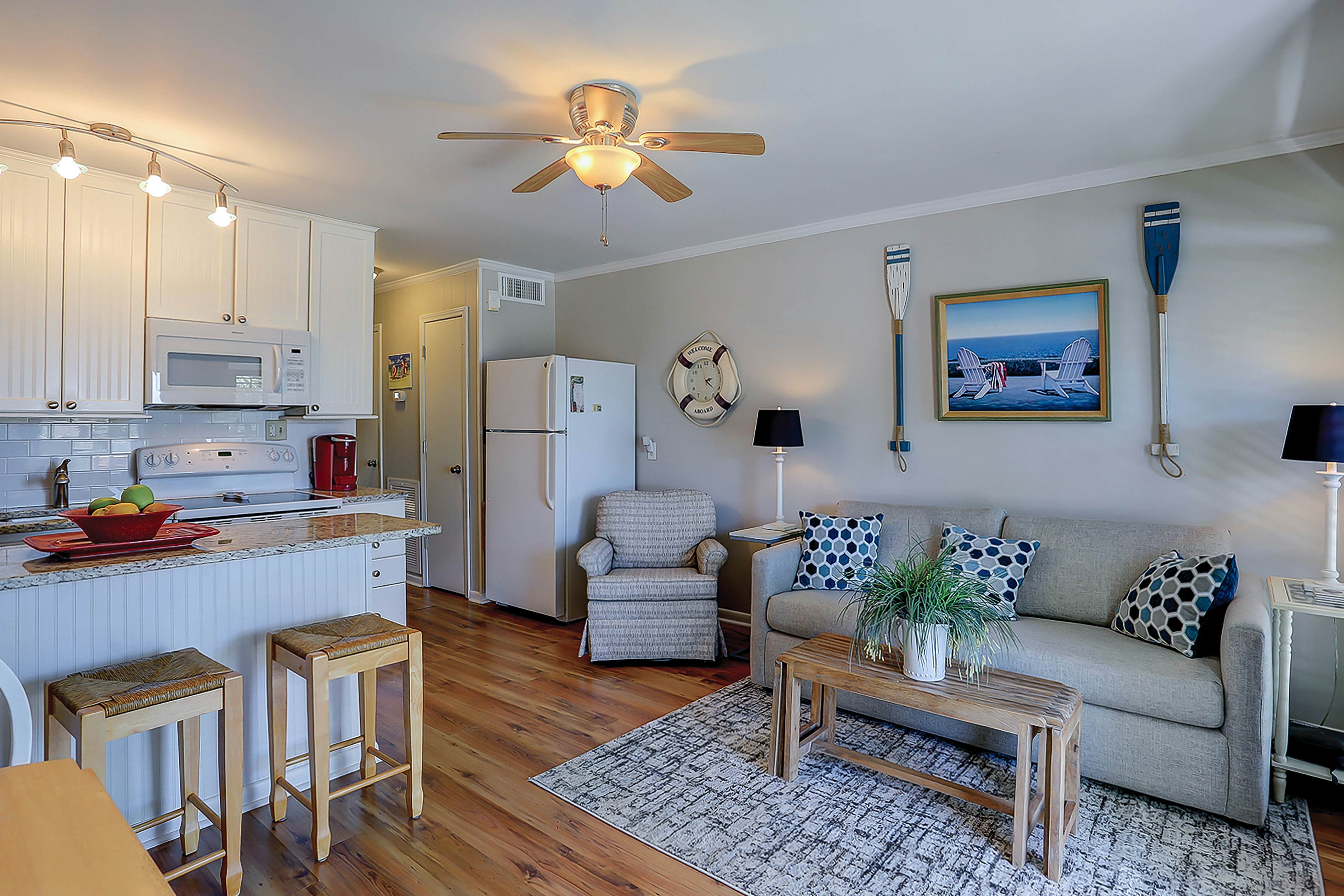 Beachfront condo with pool, beach access, pier, private balcony, & central AC