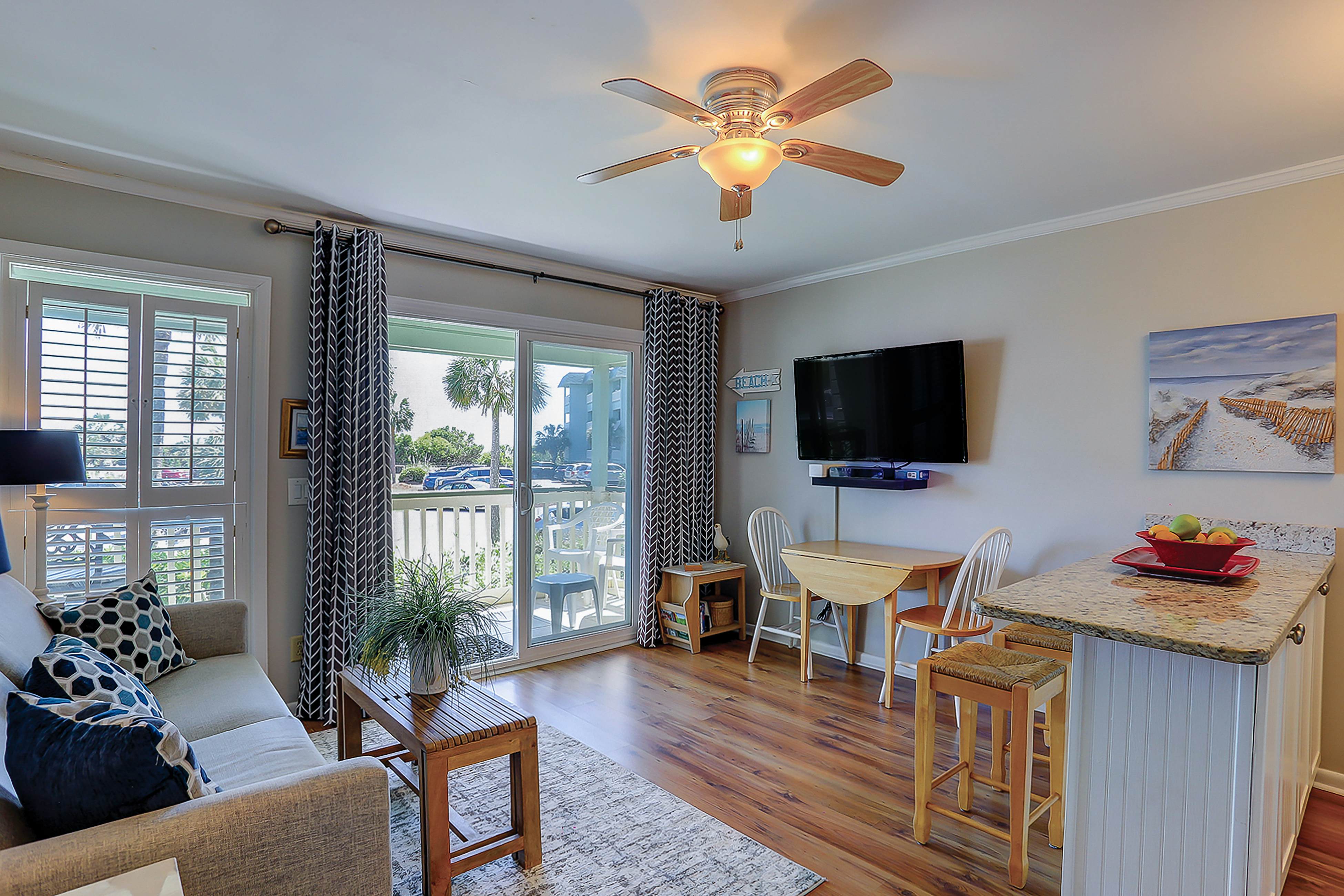 Beachfront condo with pool, beach access, pier, private balcony, & central AC