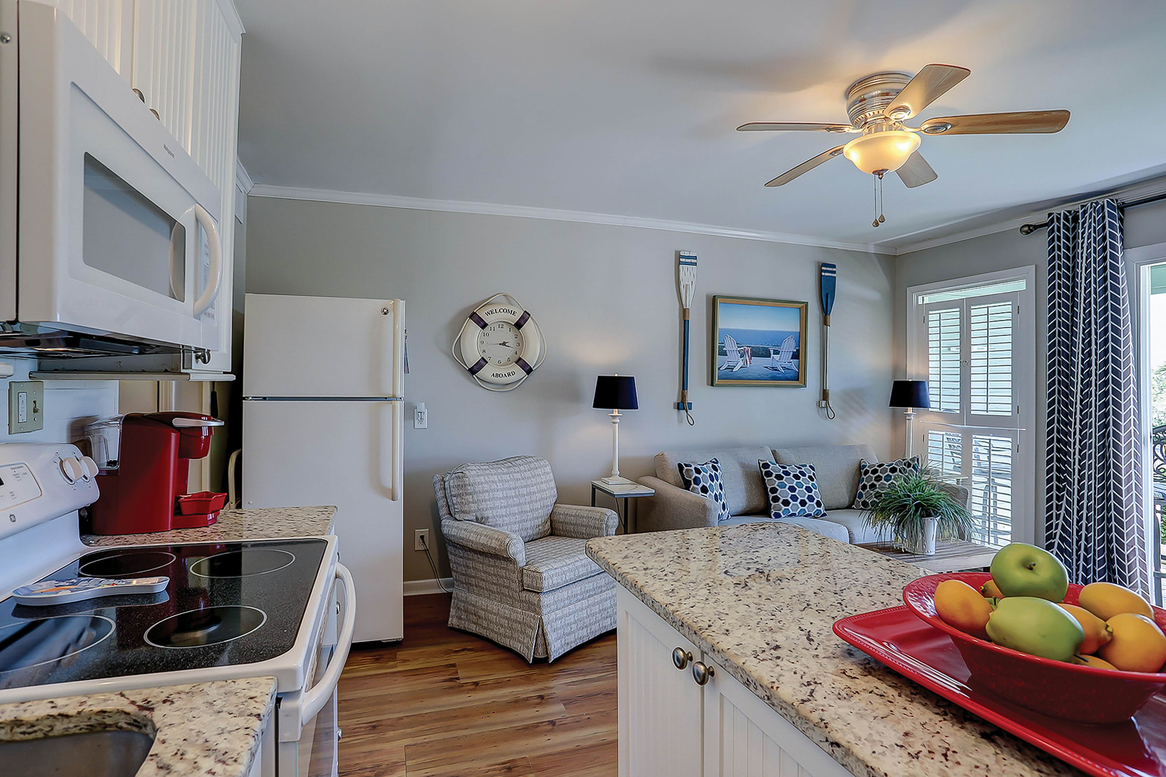 Beachfront condo with pool, beach access, pier, private balcony, & central AC