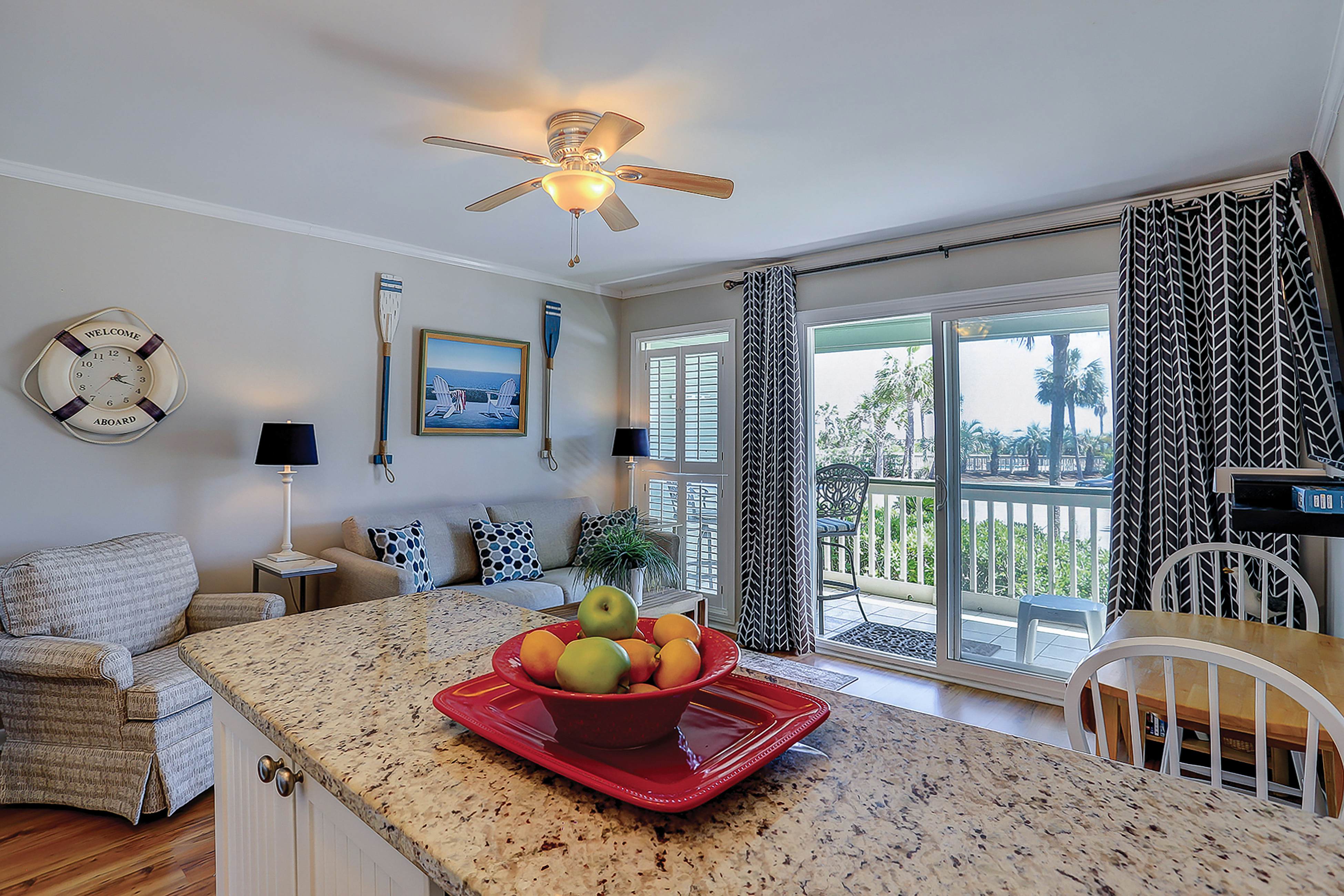 Beachfront condo with pool, beach access, pier, private balcony, & central AC