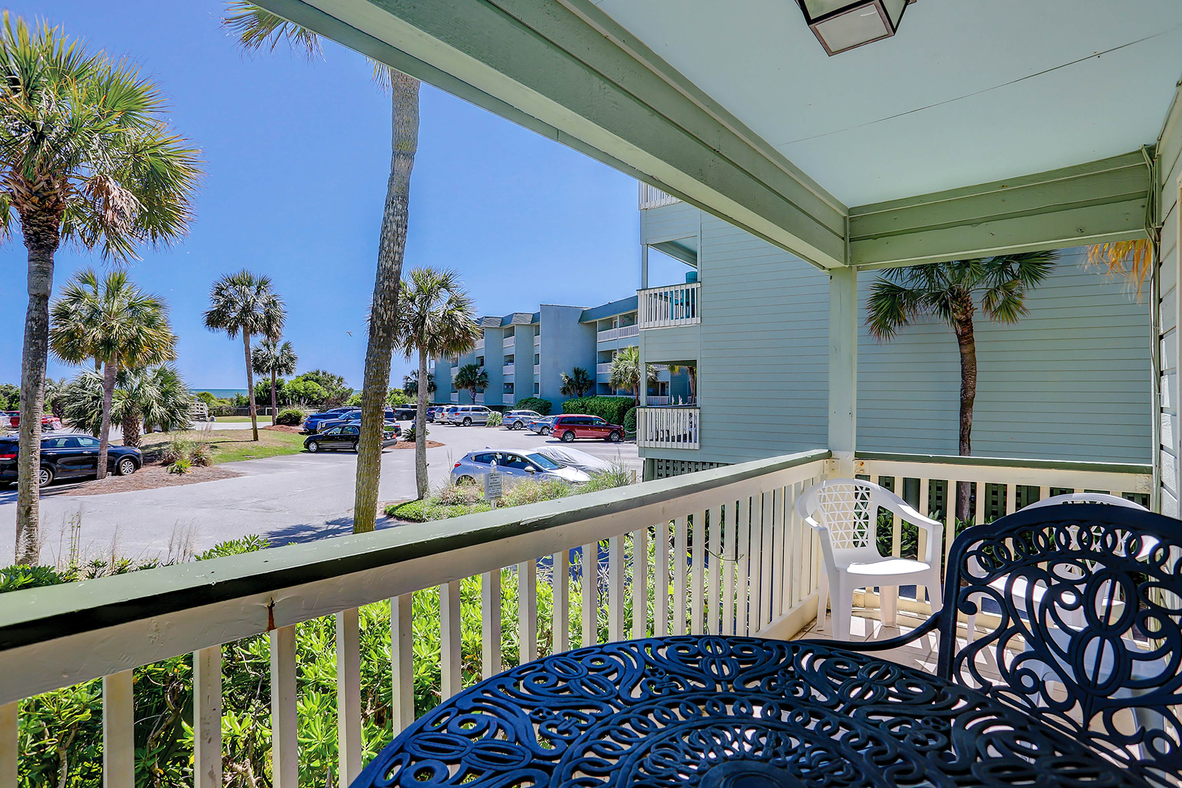 Beachfront condo with pool, beach access, pier, private balcony, & central AC