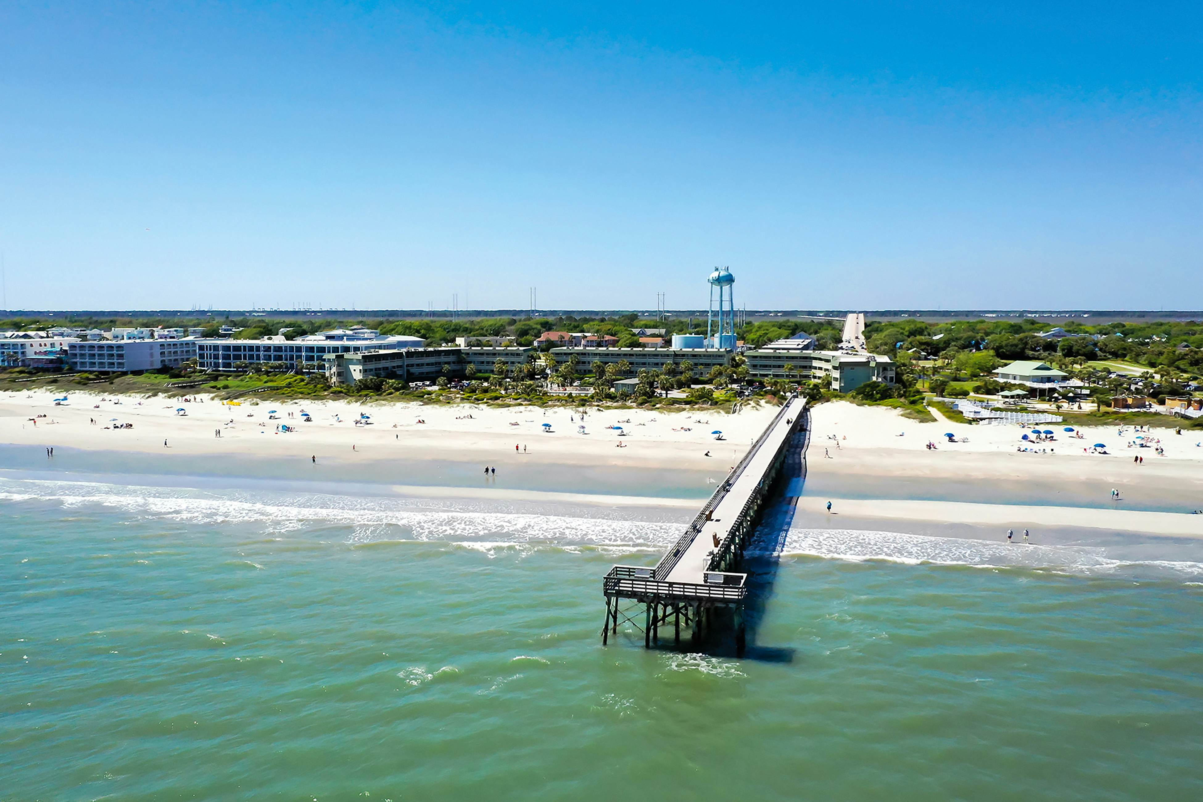 Beachfront condo with pool, beach access, pier, private balcony, & central AC