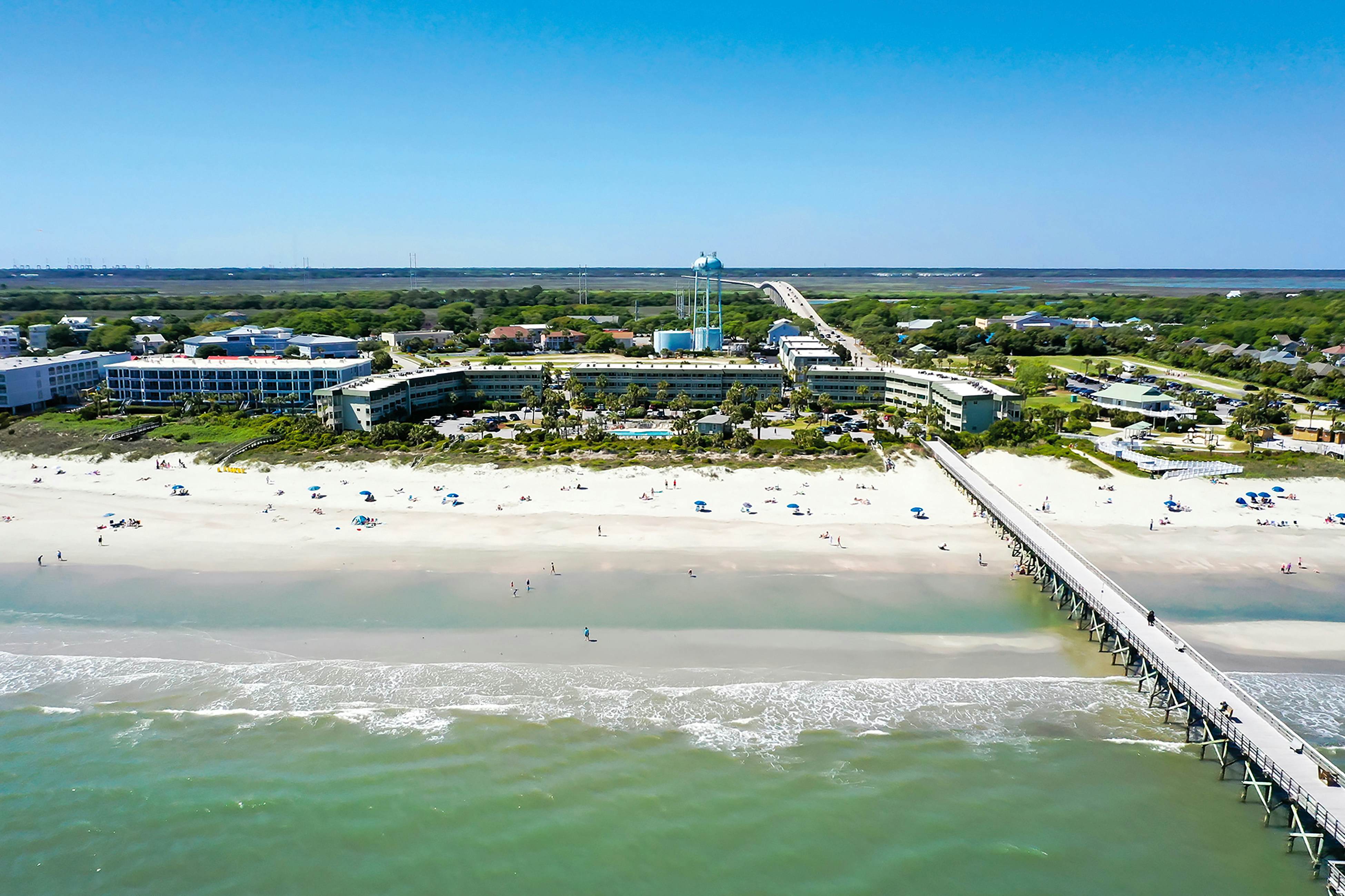 Beachfront condo with pool, beach access, pier, private balcony, & central AC