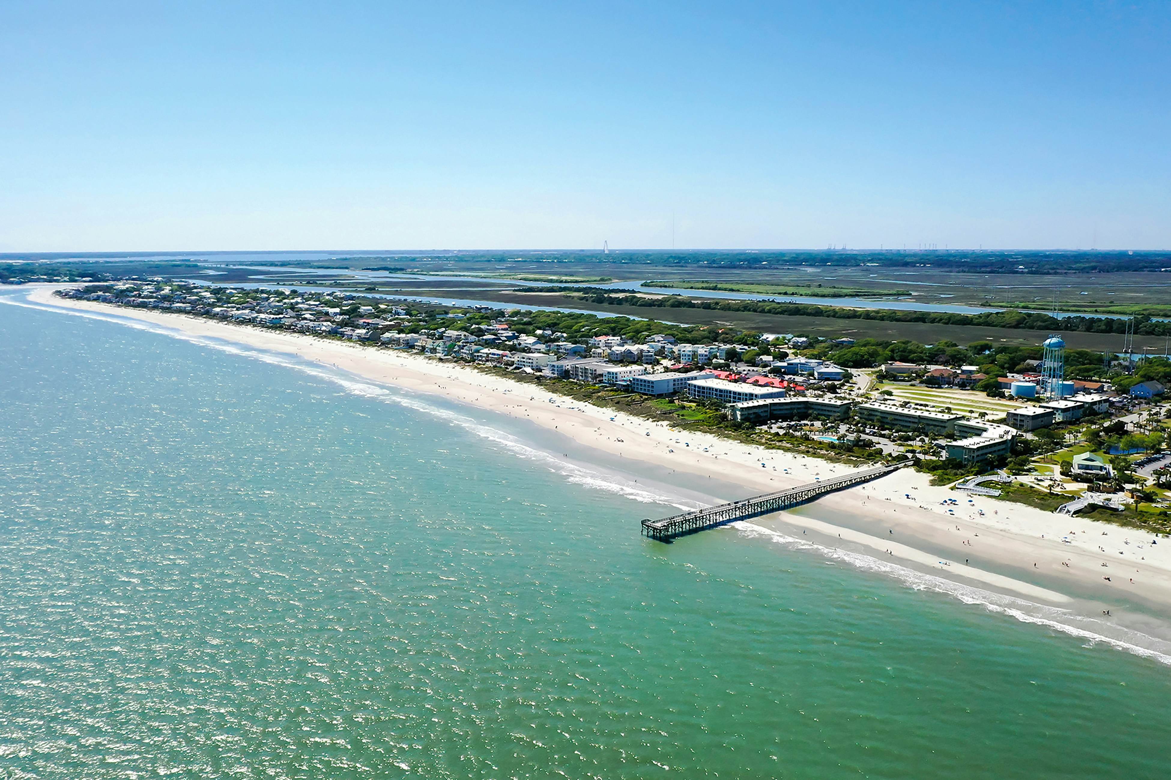 Beachfront condo with pool, beach access, pier, private balcony, & central AC