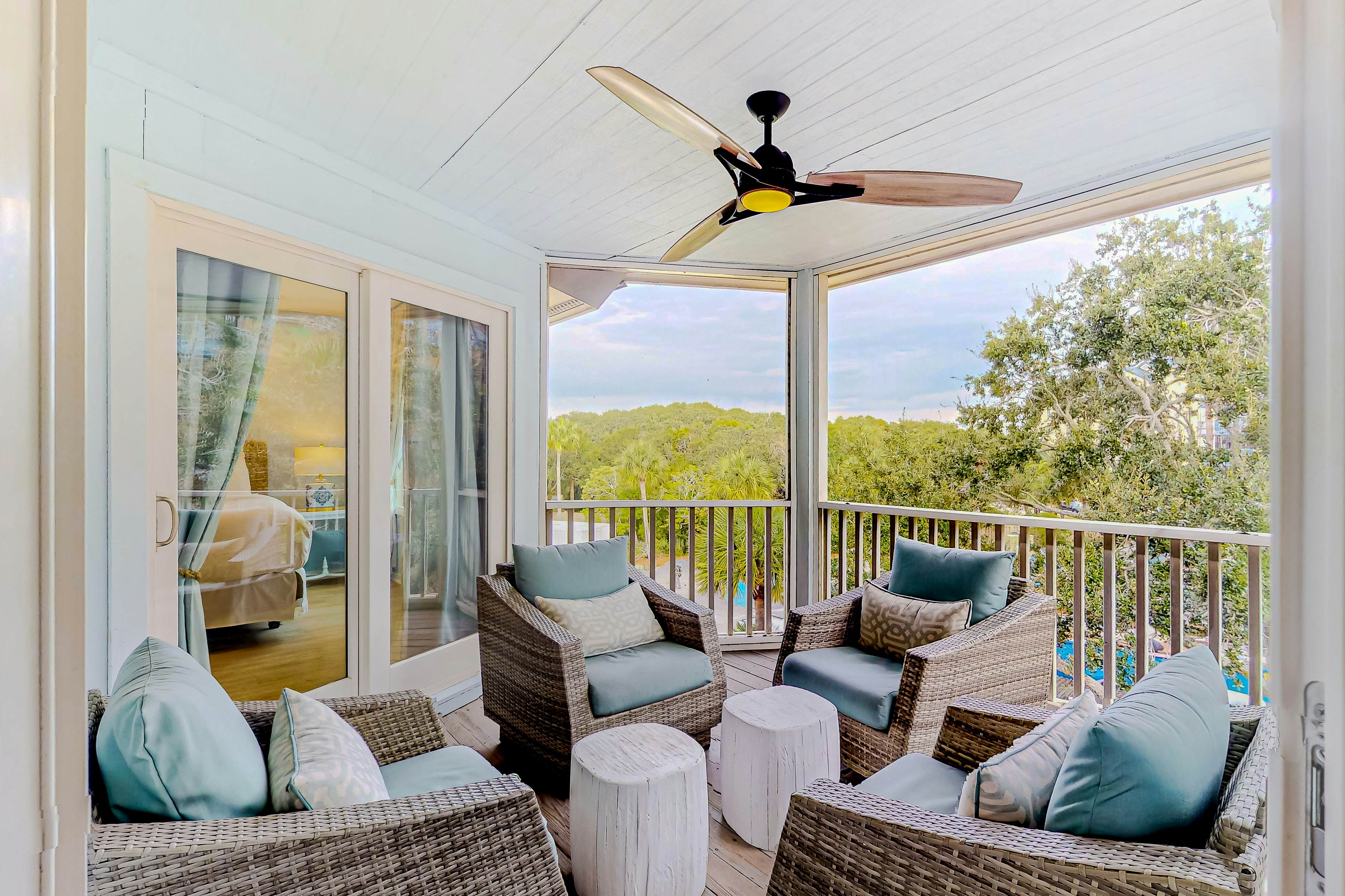 Two-story condo near beach with on-site pool & screened deck