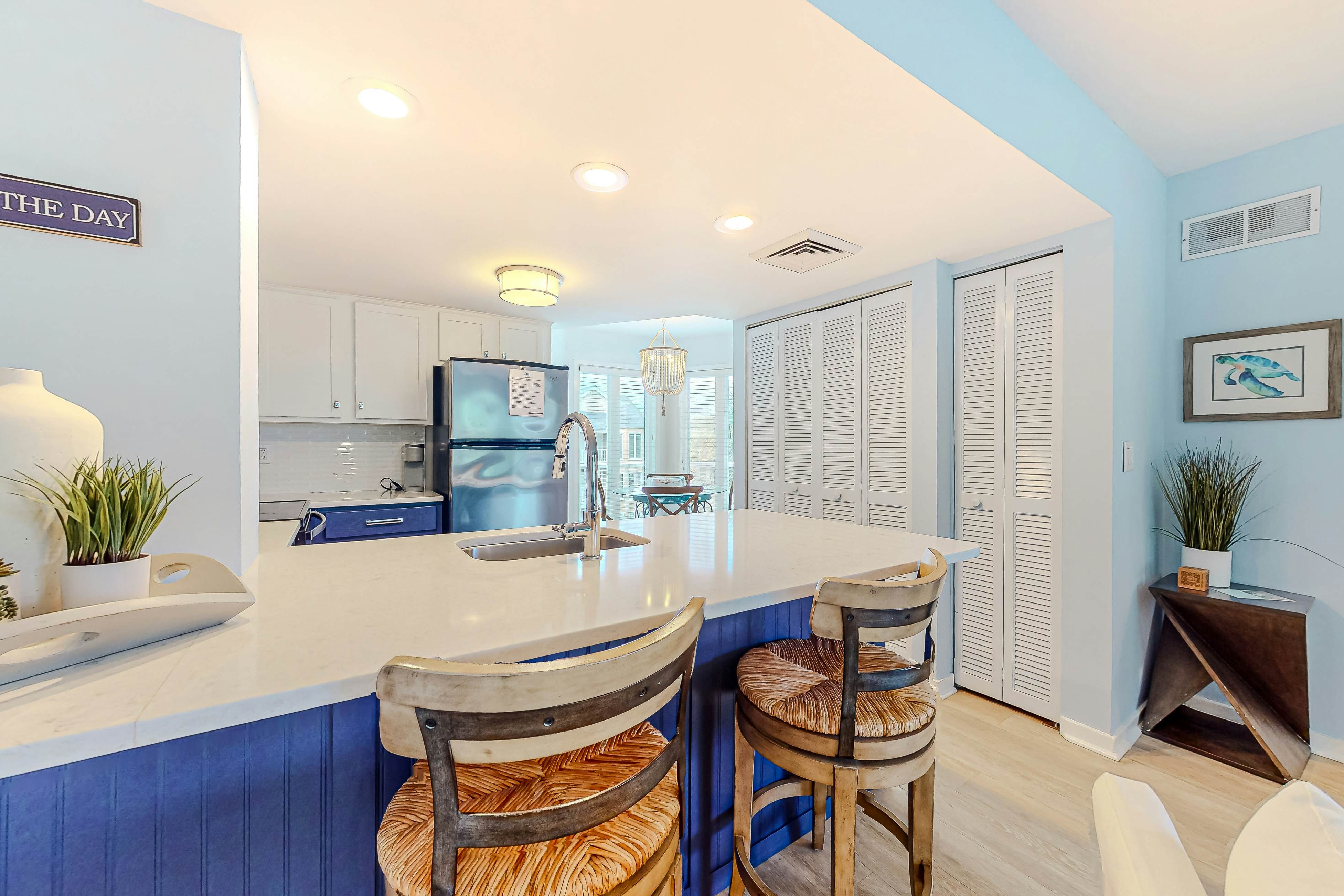 Two-story condo near beach with on-site pool & screened deck