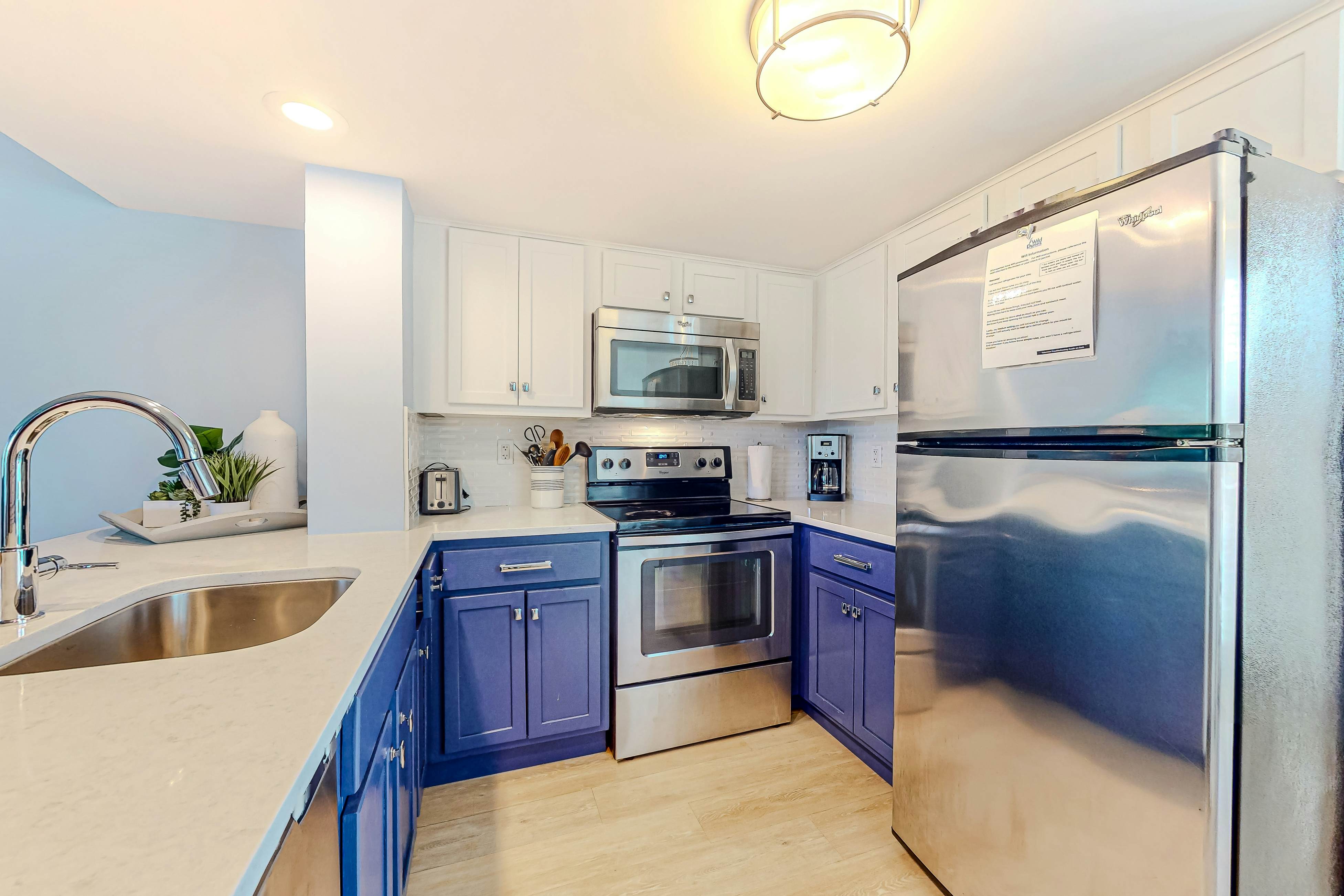 Two-story condo near beach with on-site pool & screened deck