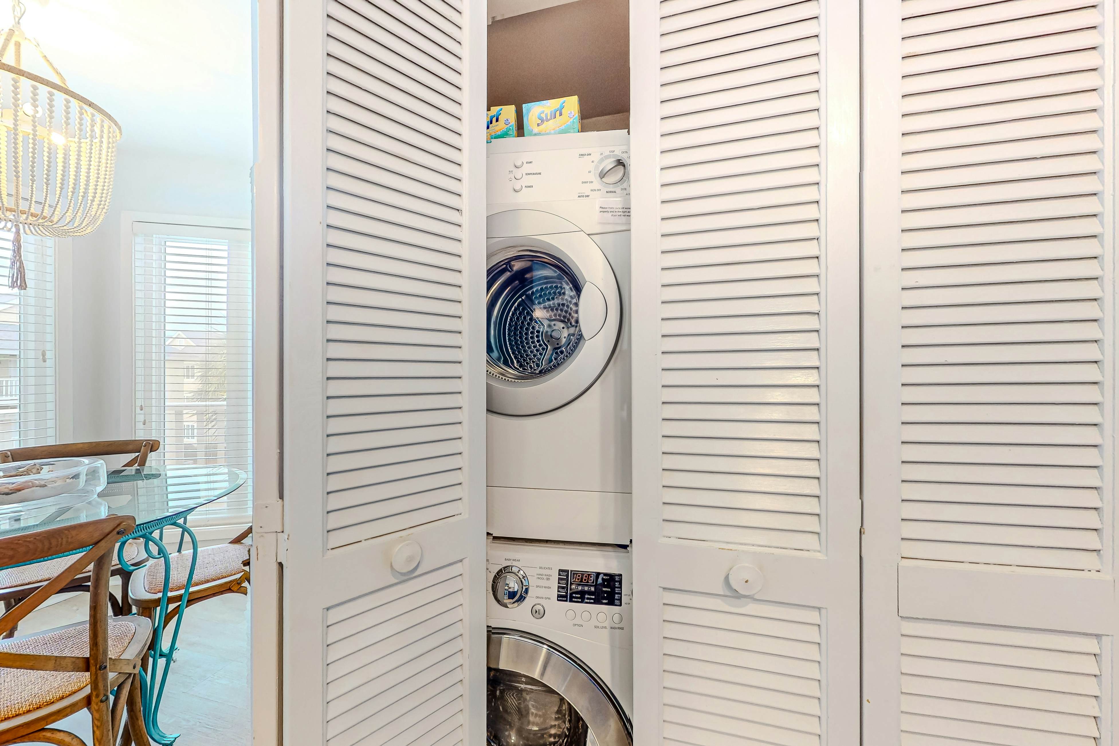 Two-story condo near beach with on-site pool & screened deck