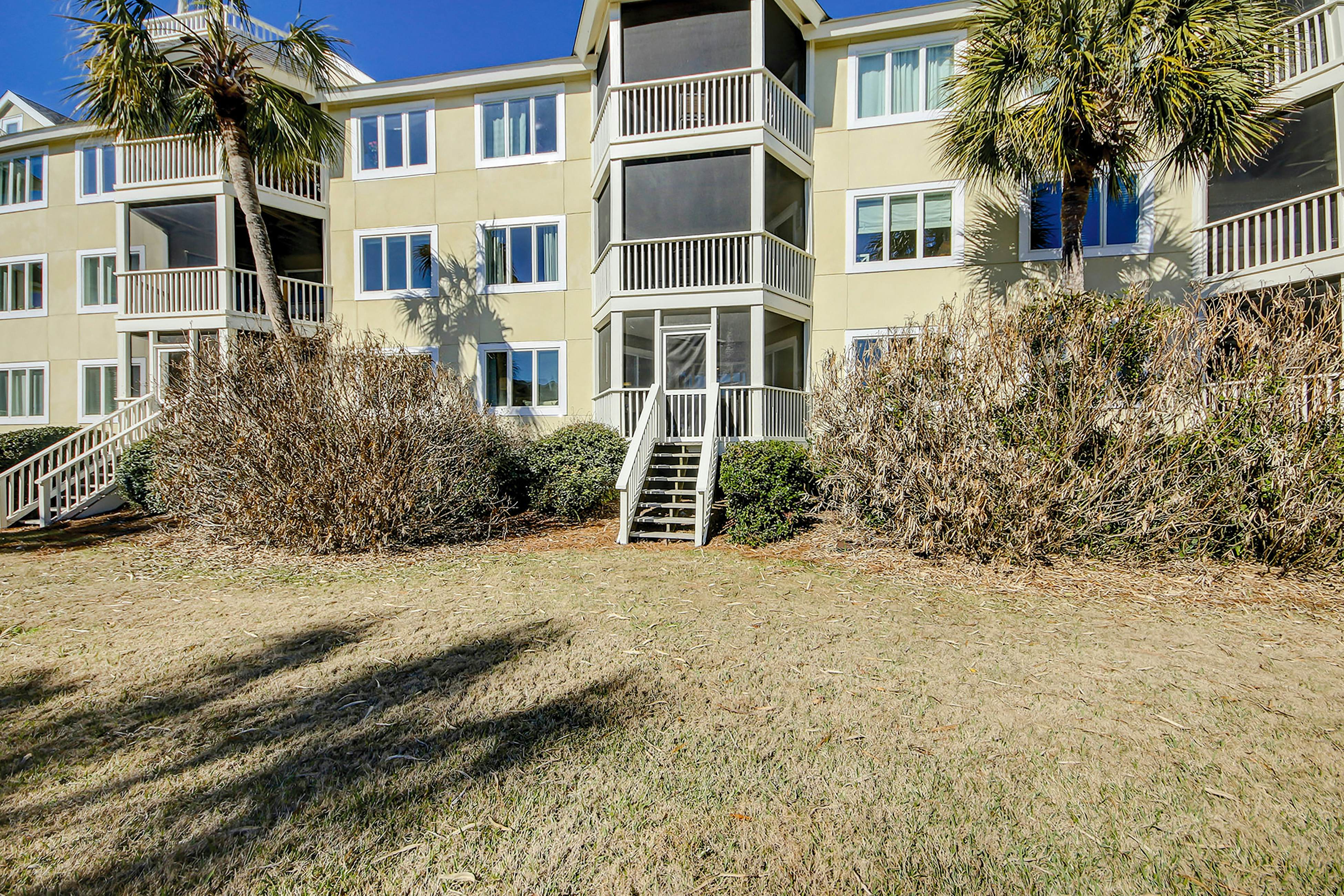 Two-story condo near beach with on-site pool & screened deck