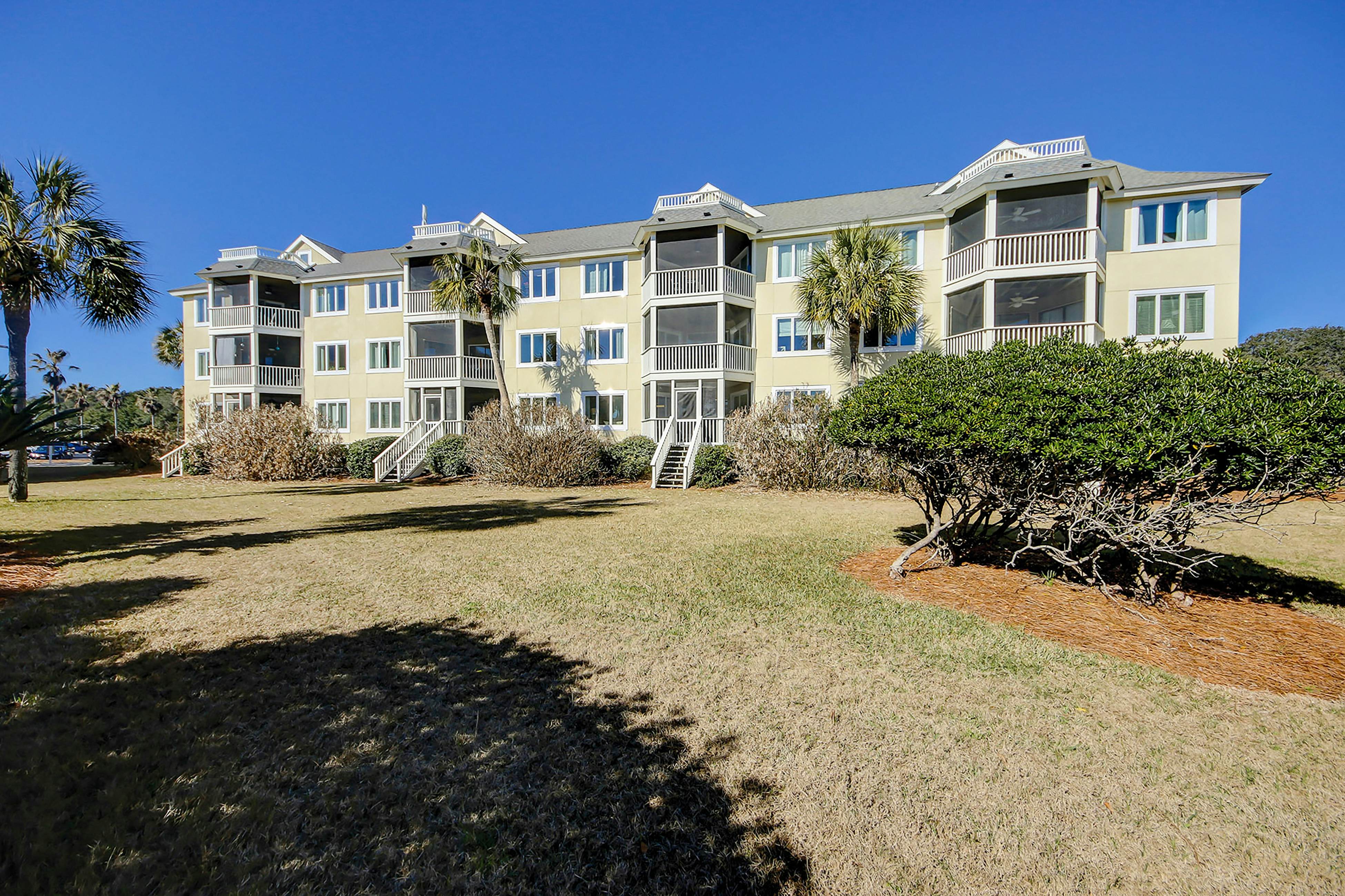 Two-story condo near beach with on-site pool & screened deck