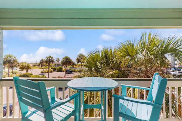 Oceanfront condo with water views, pool, balcony, & easy beach access