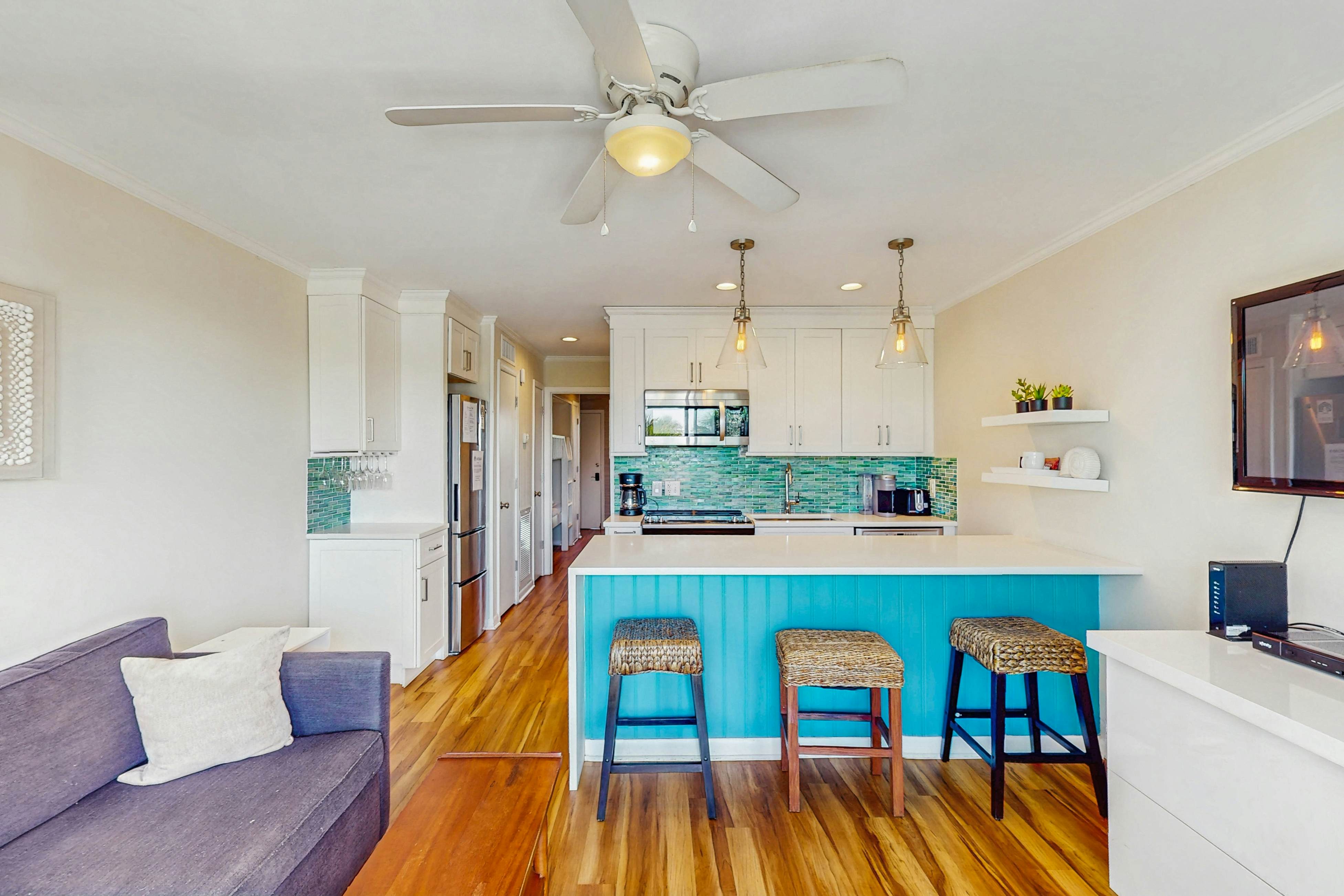 Oceanfront condo with water views, pool, balcony, & easy beach access