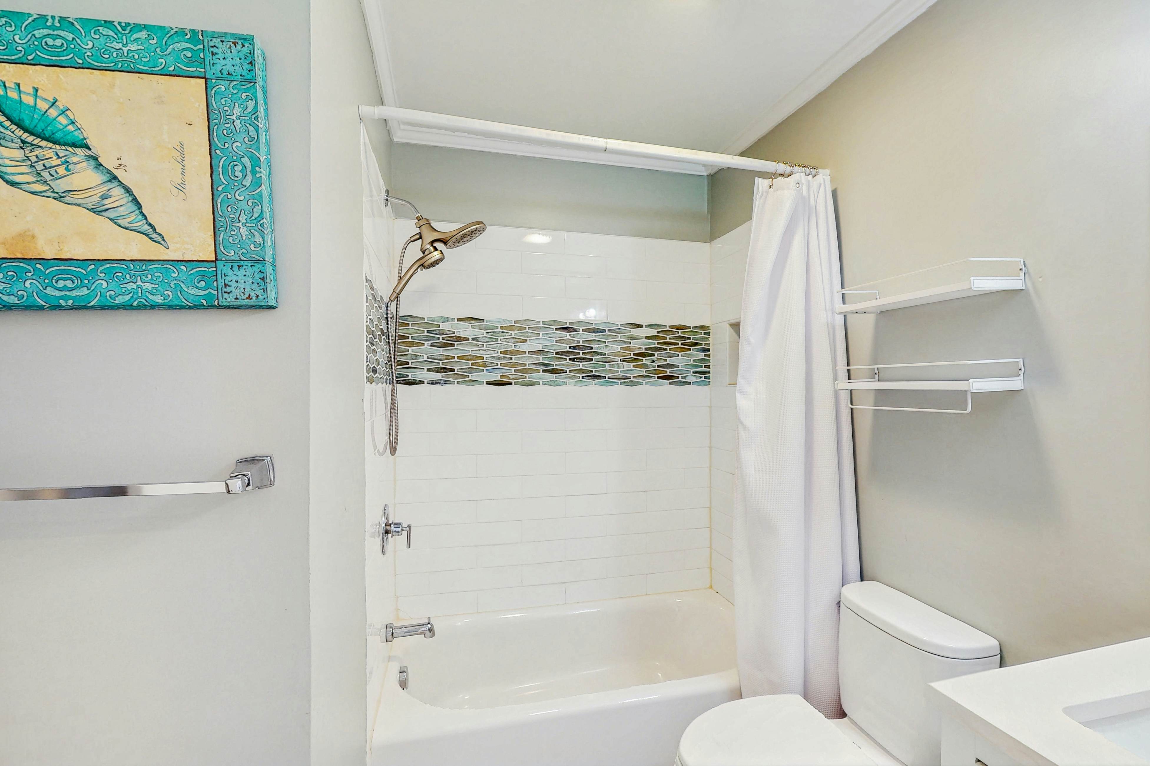 Oceanfront condo with water views, pool, balcony, & easy beach access