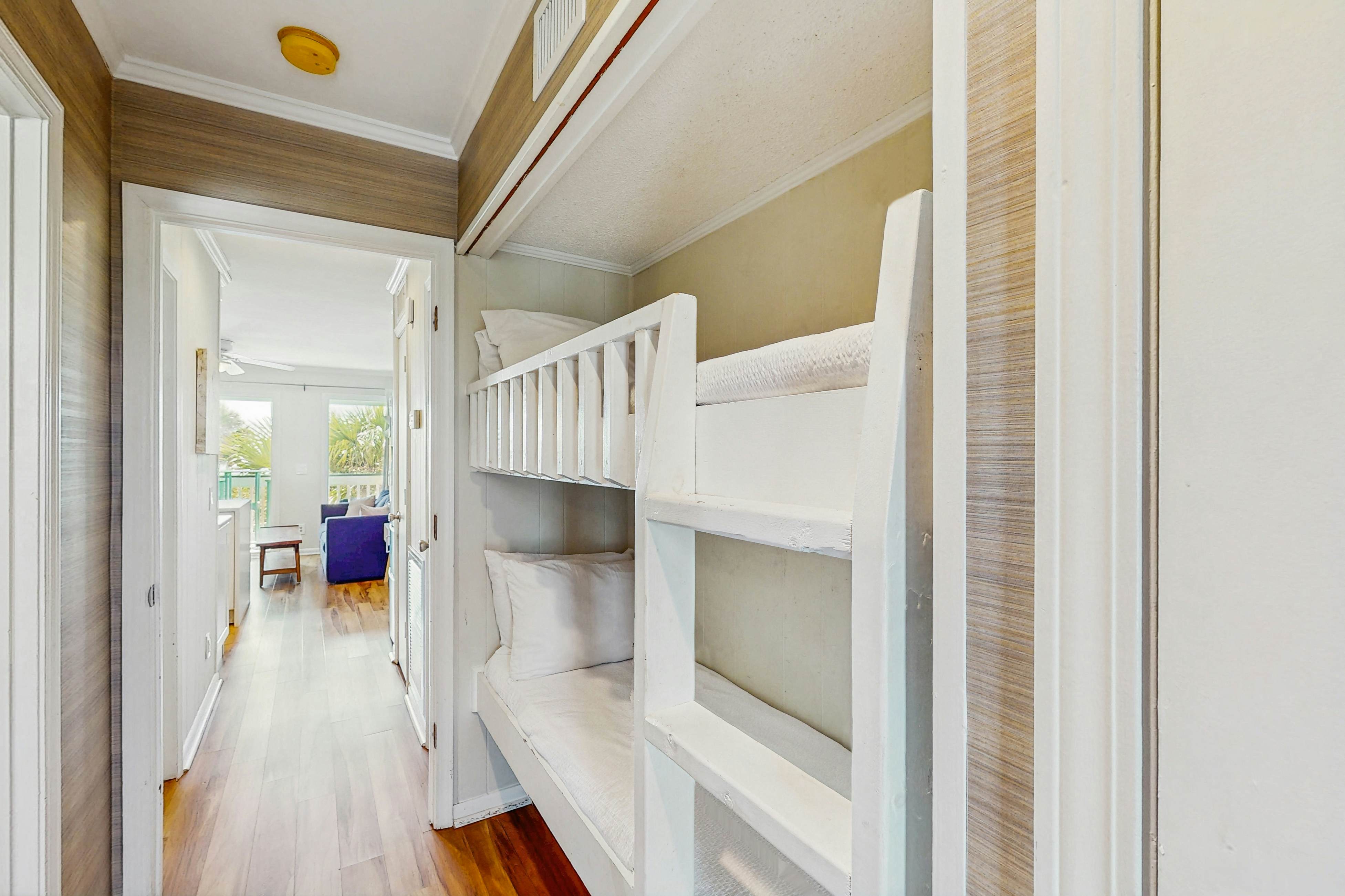 Oceanfront condo with water views, pool, balcony, & easy beach access