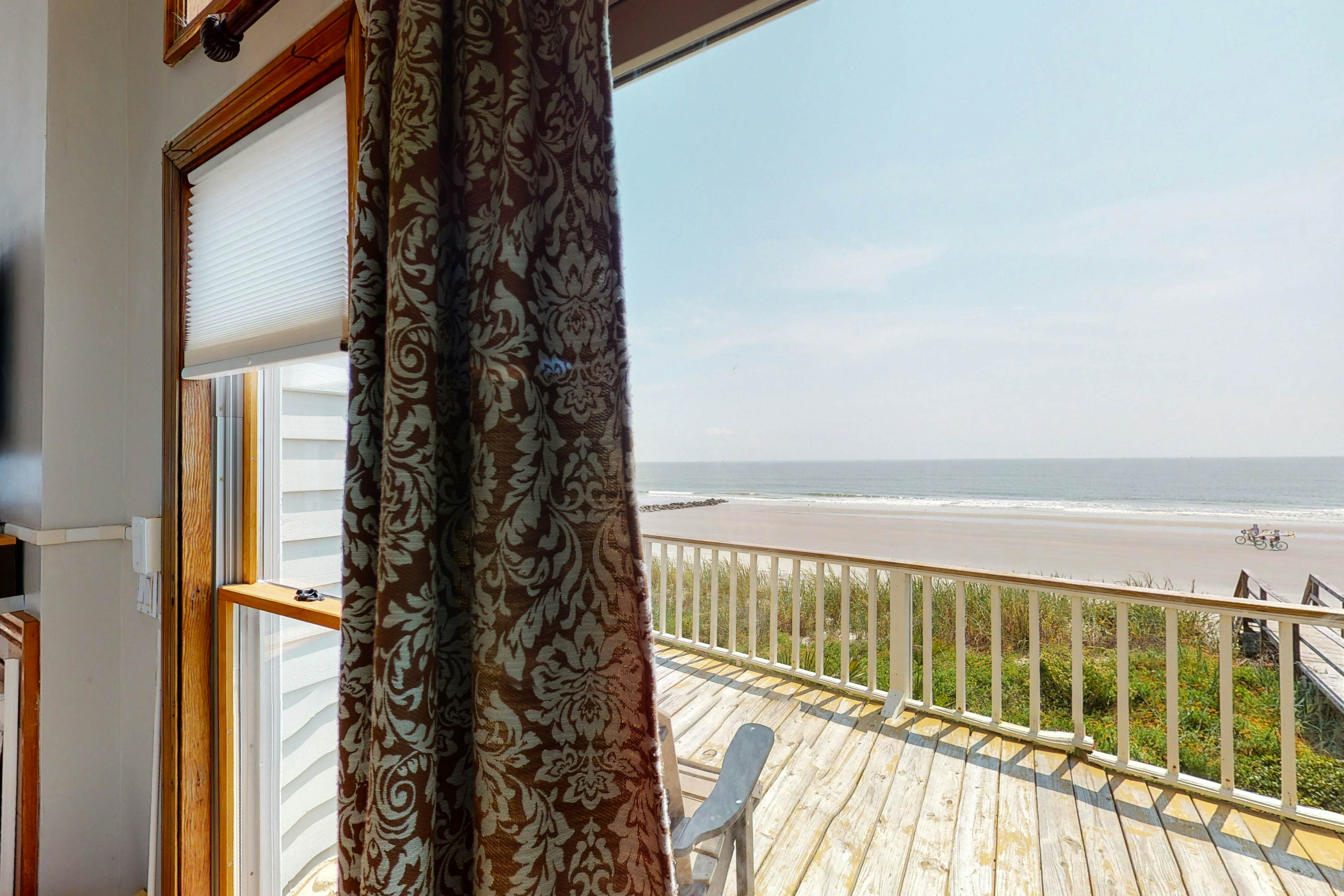 Oceanfront home with stunning ocean views, central AC, and private W/D