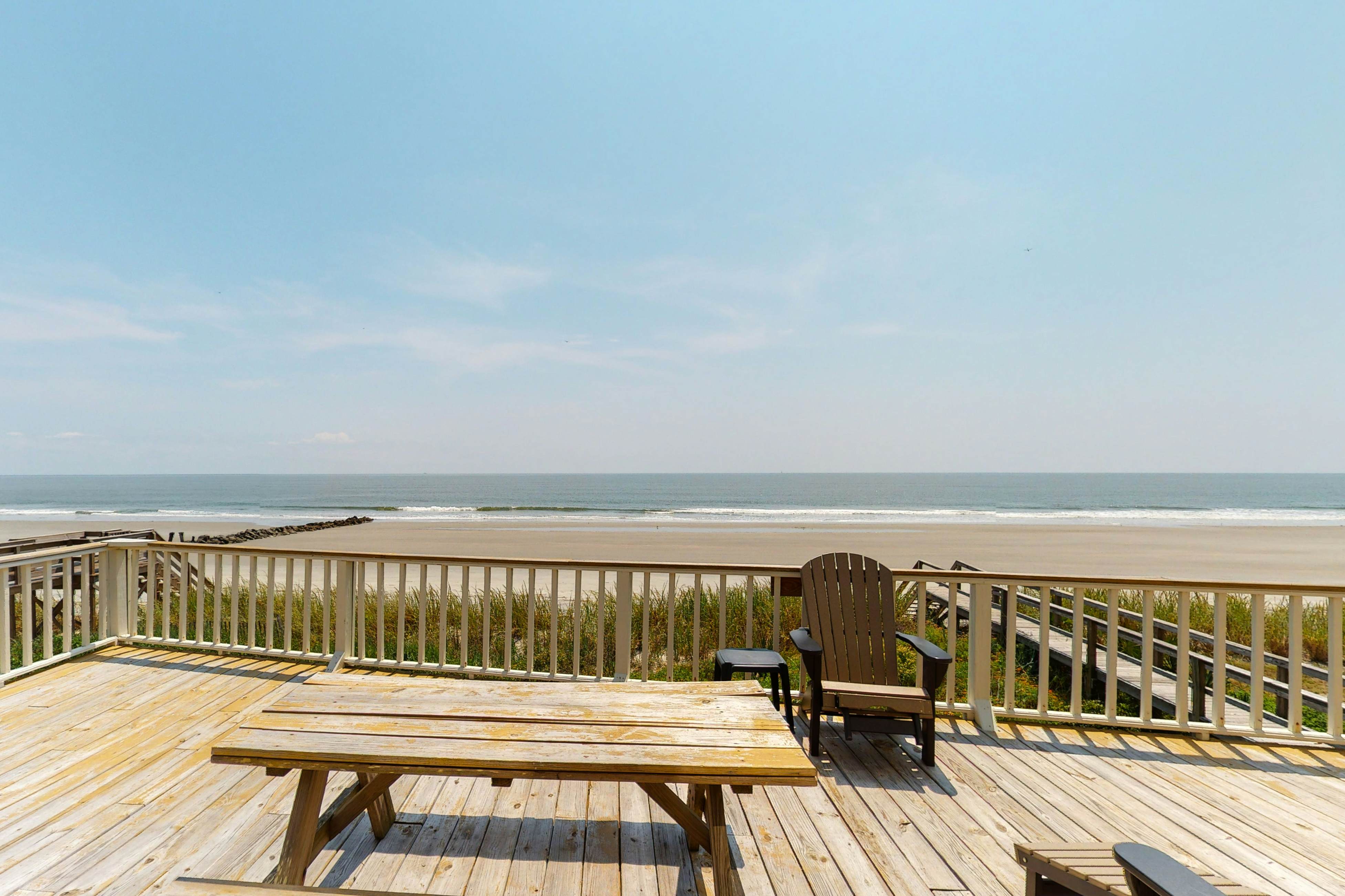 Oceanfront home with stunning ocean views, central AC, and private W/D