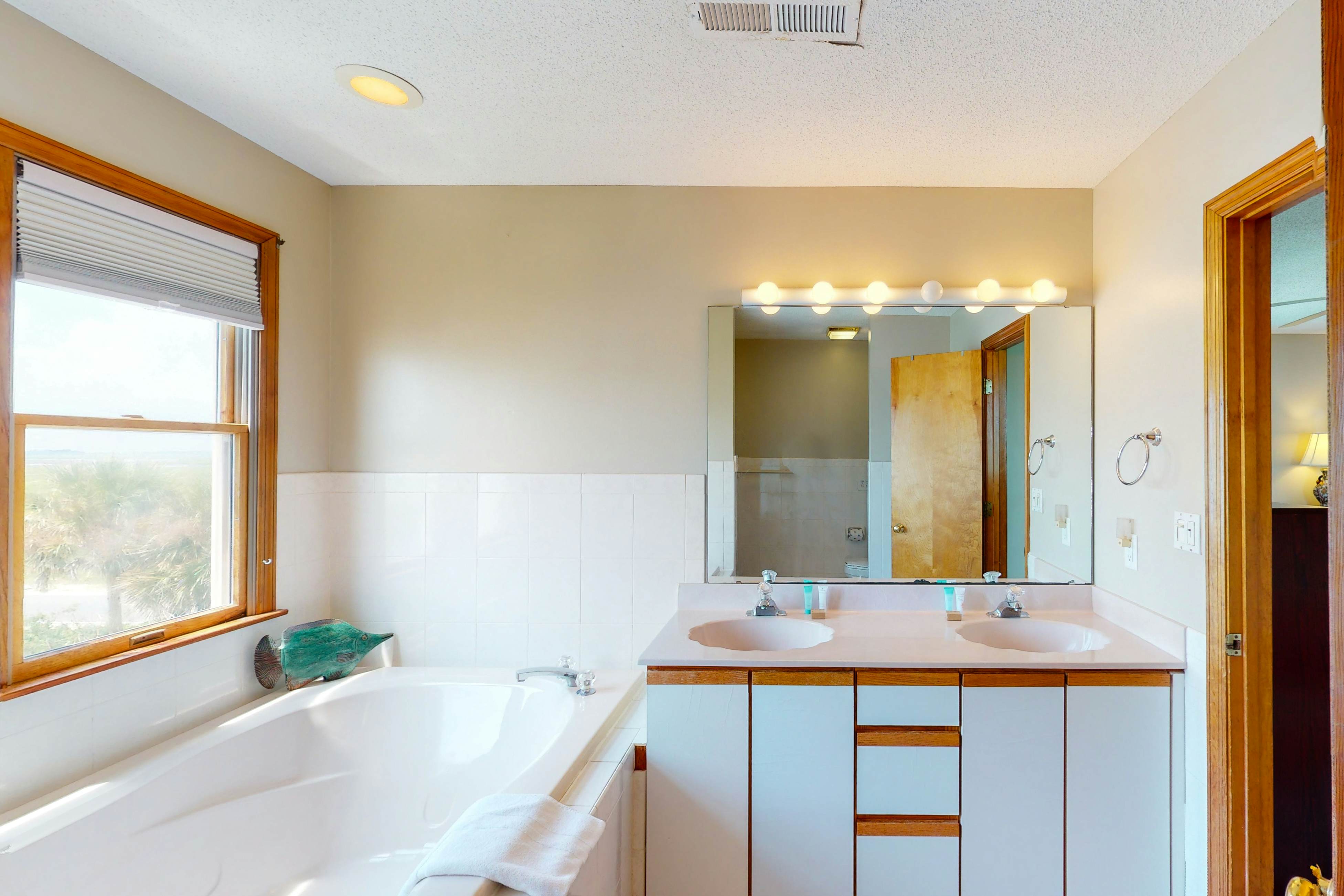 Oceanfront home with stunning ocean views, central AC, and private W/D