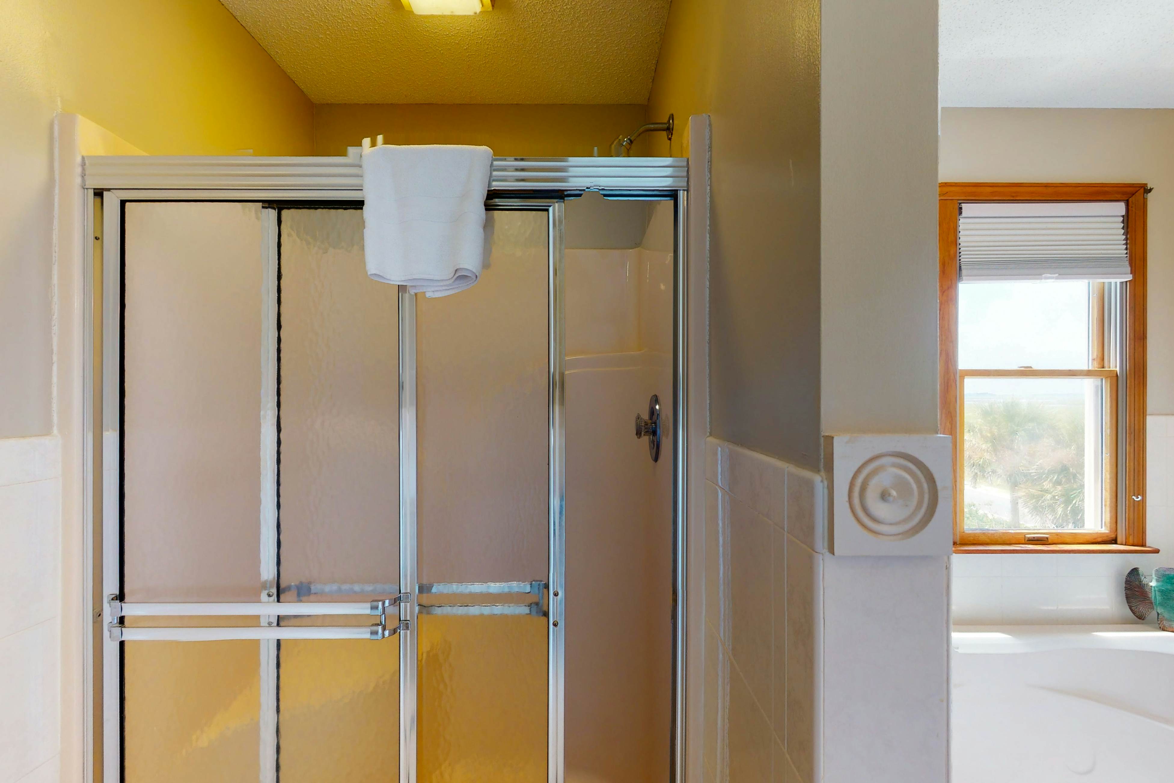 Oceanfront home with stunning ocean views, central AC, and private W/D