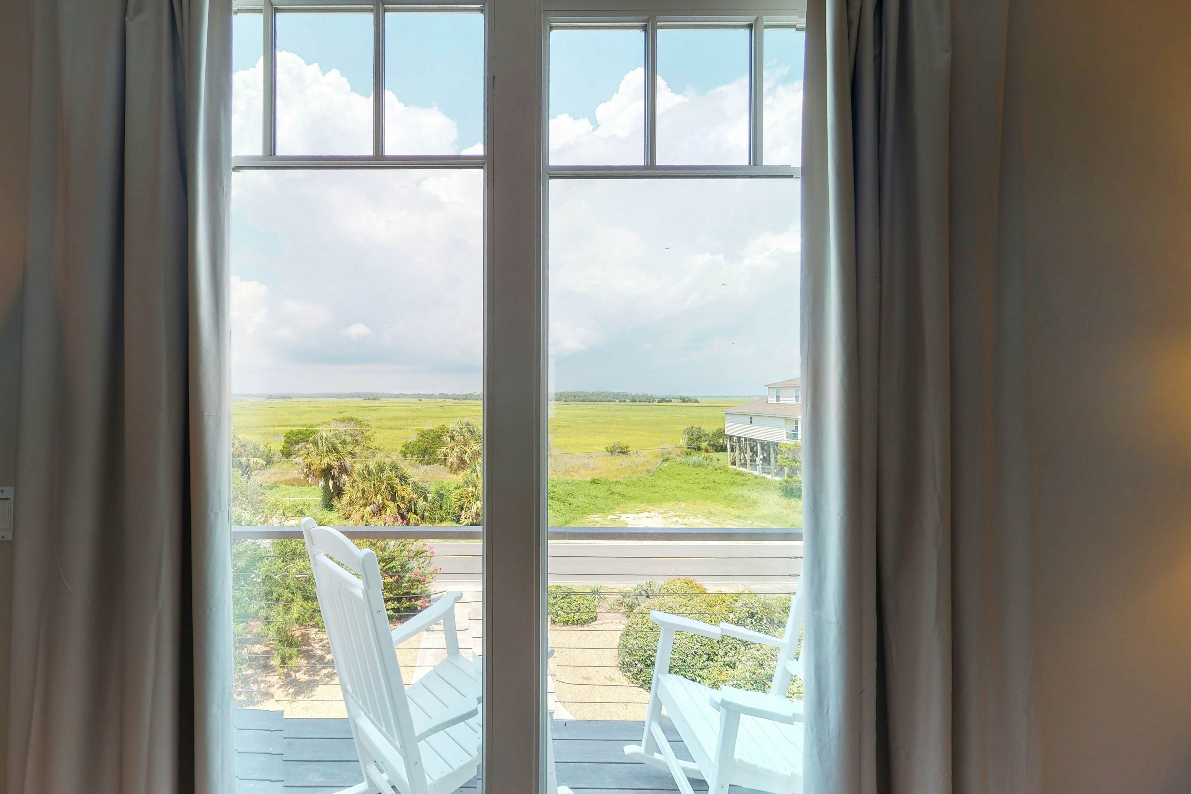 Oceanfront home with stunning ocean views, central AC, and private W/D