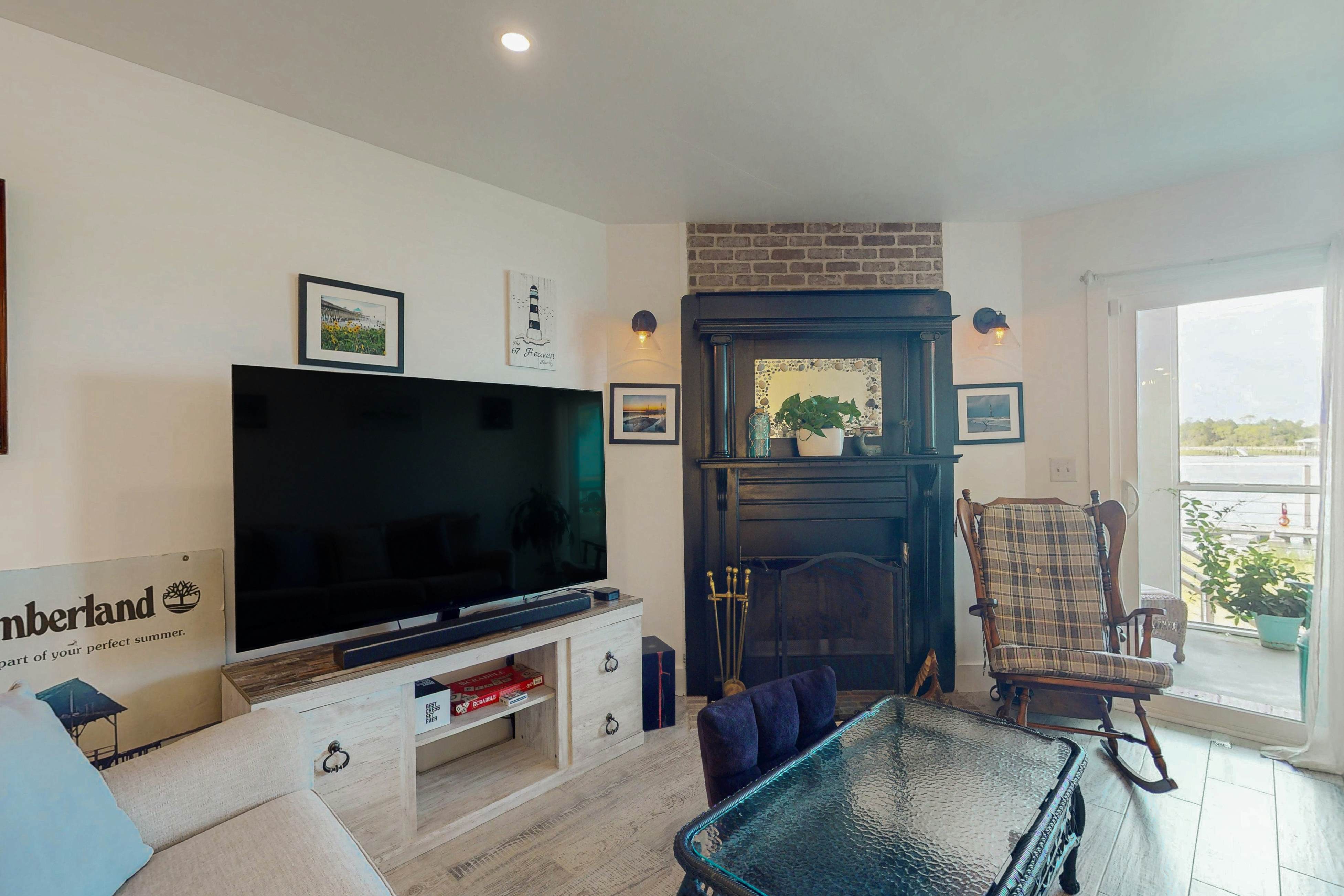 1st-floor riverfront condo w/spectacular river views, balcony, and central AC