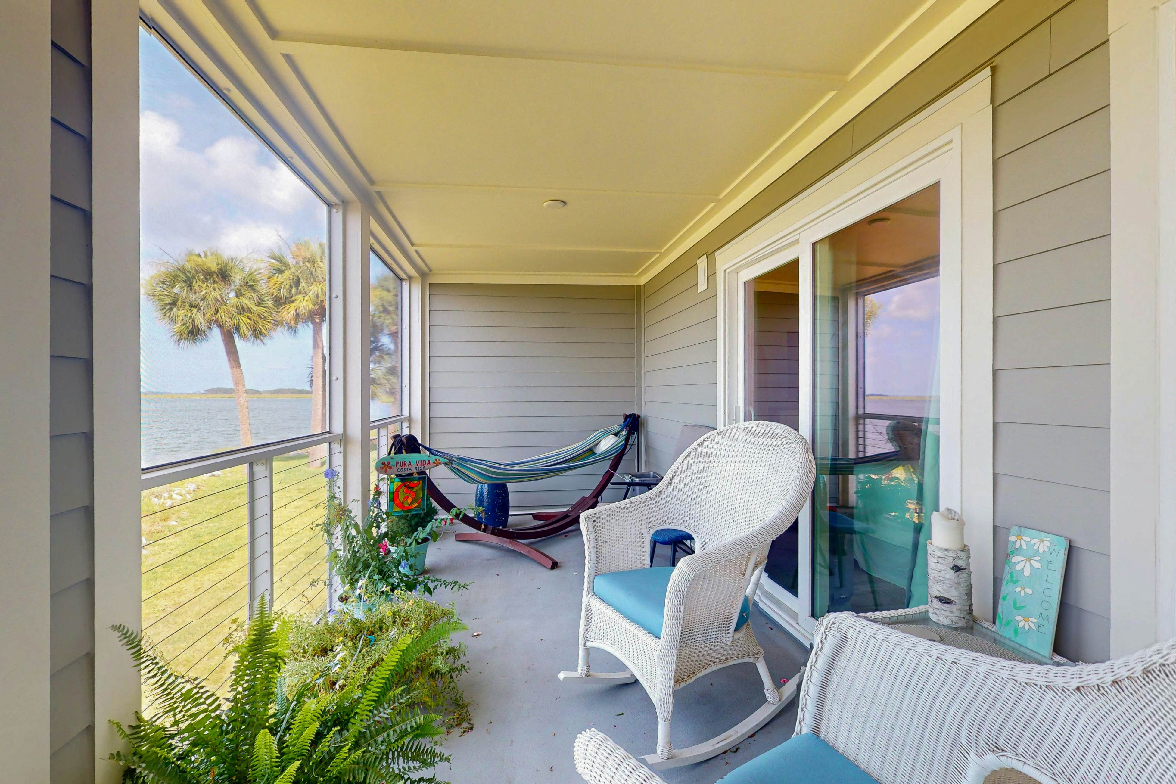 1st-floor riverfront condo w/spectacular river views, balcony, and central AC