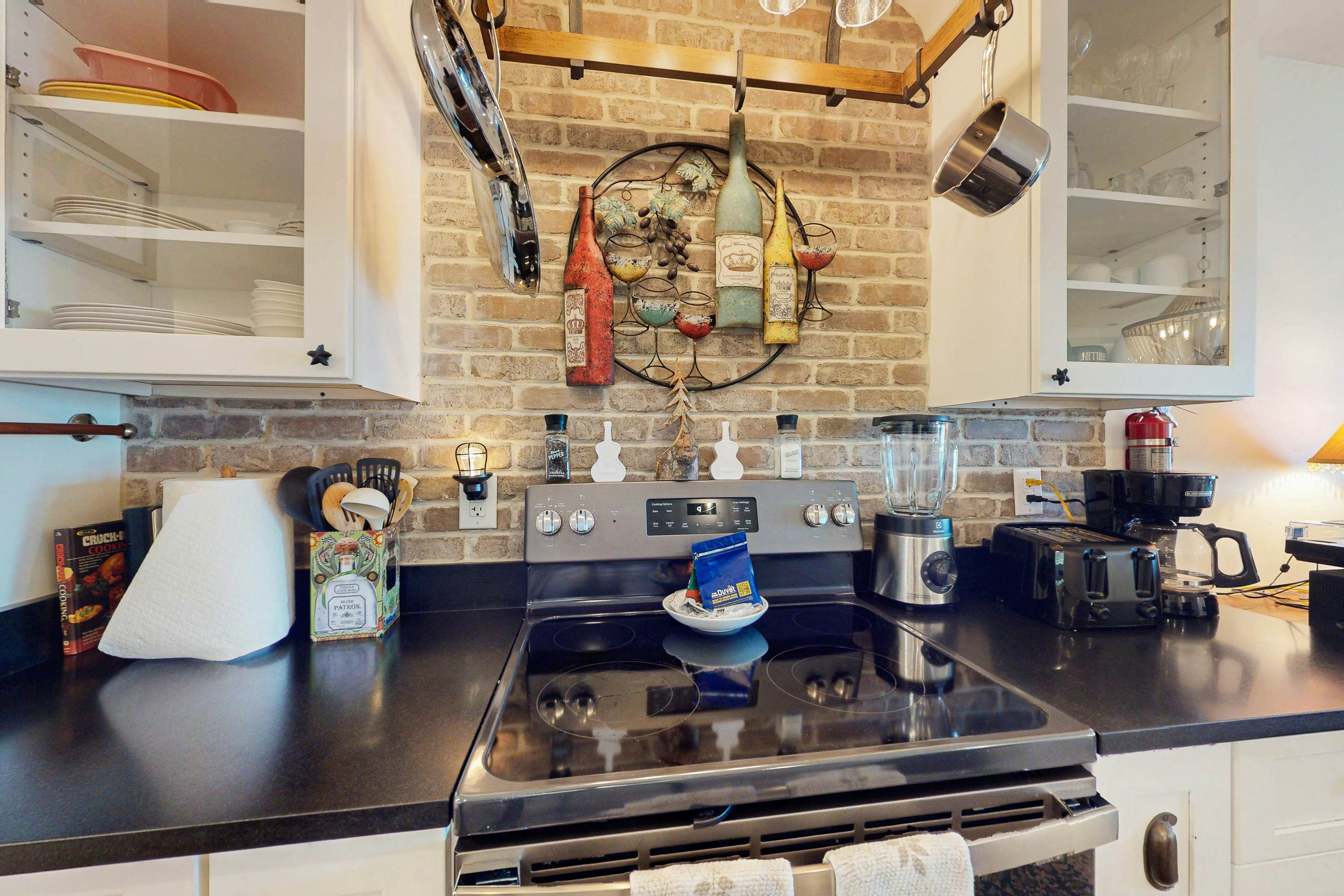 1st-floor riverfront condo w/spectacular river views, balcony, and central AC