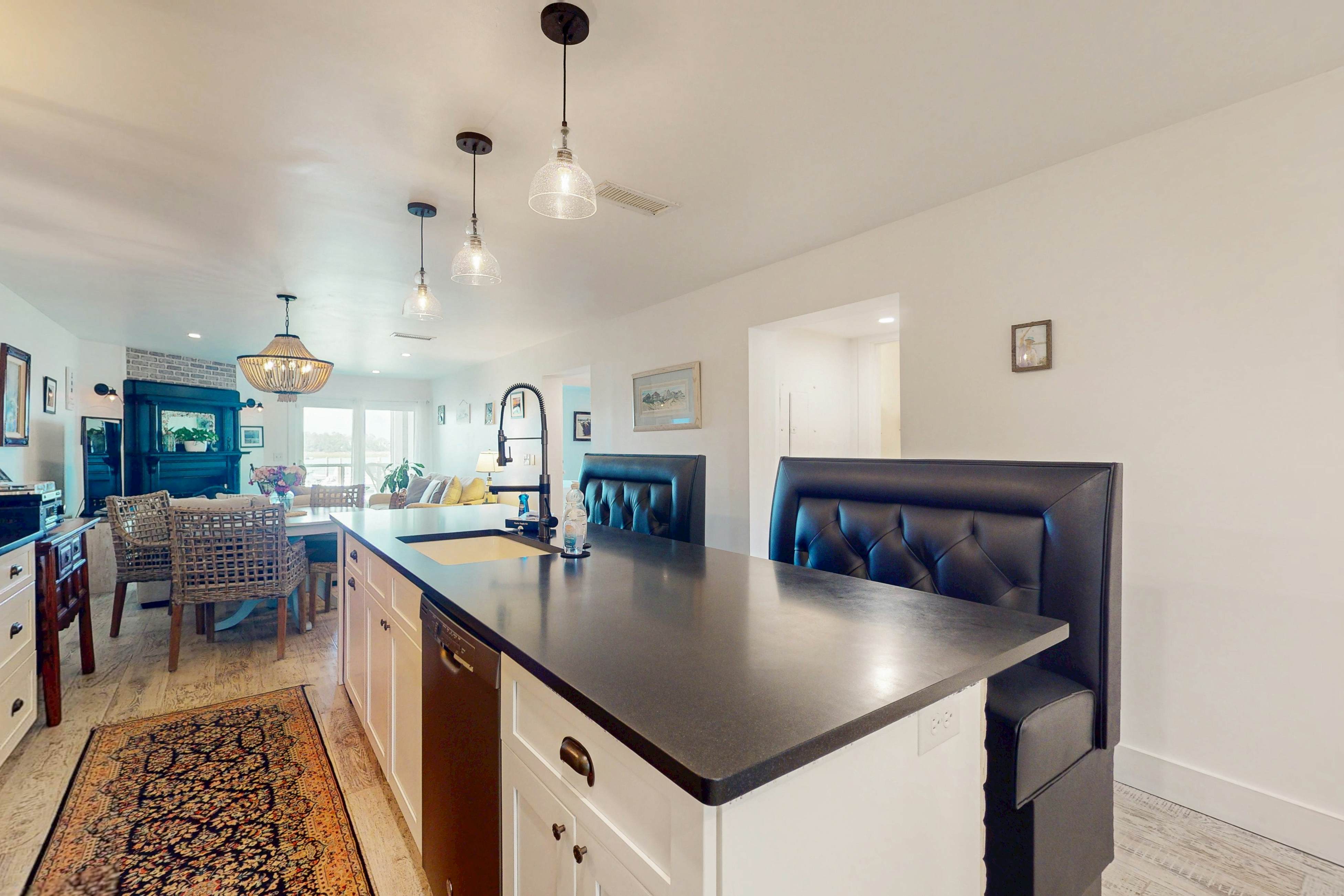 1st-floor riverfront condo w/spectacular river views, balcony, and central AC